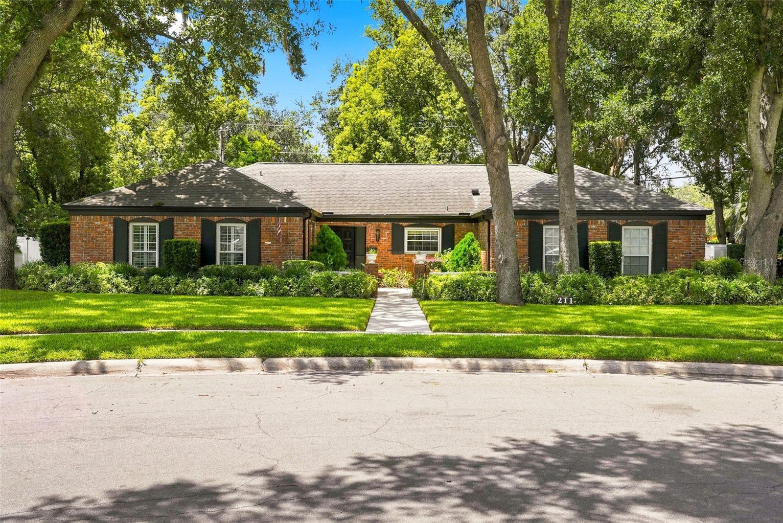 Nestled beneath a canopy of majestic oak trees in the highly sought after Maitland Woods neighborhood, this beautifully updated 3 bedroom, 2.5 bathroom pool home sits on an expansive .45 acre homesite, offering timeless charm, thoughtful updates, and the lifestyle you've been searching for.From the moment you arrive, you'll appreciate the instant curb appeal of this classic brick ranch home, framed by mature landscaping and one of Maitland Woods' picturesque tree lined streets. Inside, you're welcomed by a spacious formal living room that sets the tone for the warm and inviting spaces beyond. The beautifully renovated kitchen serves as the heart of the home, featuring stylish finishes, generous workspace, and an effortless flow into the family room, where a stunning brick fireplace creates the perfect place to gather with family and friends.The spacious primary suite offers a peaceful retreat complete with a custom walk in closet and an updated ensuite bath. Two additional bedrooms provide comfortable accommodations for family, guests, or a home office.'Designed for year round Florida living, the expansive screened lanai overlooks your own private backyard oasis featuring a saltwater pool, newer pergola, outdoor shower, and an oversized fenced backyard with plenty of room to entertain, play, or simply relax beneath the shade of mature oaks.Recent improvements include a new HVAC system (2025), complete replumbing, and updated electrical, offering peace of mind for years to come.Life in Maitland Woods is about more than just the home. Enjoy evening walks around the spring fed waters of Lake Sybelia, where neighbors gather to take in beautiful sunsets beneath the oak canopy. Just minutes away, charming downtown Maitland offers local restaurants, community events, the weekly farmers market, and beloved traditions like Movies in the Park. With Orangewood Christian School within walking distance and easy access to downtown Maitland, downtown Orlando, shopping, dining, and major roadways, this location perfectly blends small town charm with everyday convenience.This is more than a home. This is the sign you've been looking for.It's an opportunity to enjoy the timeless character, community, and lifestyle that have made Maitland Woods one of Central Florida's most cherished neighborhoods.