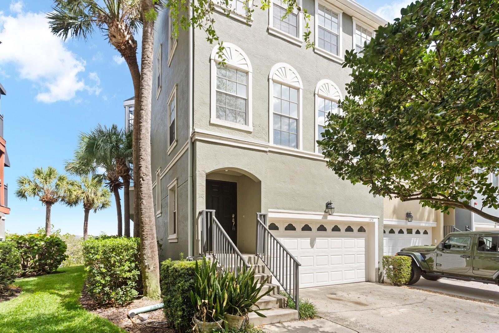 The ultimate in urban waterfront living on the beautifully landscaped Harbour Island! Perfectly situated in a peaceful and quiet gated community yet within walking distance to the vibrant downtown for top-tier dining, shopping and fitness options such as Water Street, Sparkman Wharf, Amalie Arena, the Tampa Riverwalk. Easy access to St. Petersburg, major interstates, and Tampa International Airport. Rarely available, this Harbourside waterfront brownstone-style end-unit townhome is the largest floor plan filled with natural light, offering a bright and airy ambiance throughout. Thoughtfully designed with a versatile and open layout, this residence blends comfort, functionality, and an unbeatable location.The main level features an open-concept living space with a flexible office nook or bar area that flows seamlessly into the kitchen and dining area—ideal for both everyday living and entertaining. The kitchen is appointed with newly updated stainless steel appliances, a breakfast bar, and direct access to a private balcony, perfect for enjoying morning coffee or evening breezes.Upstairs, the oversized primary suite provides a true retreat, complete with space for a reading nook or home office, private balcony access, and a walk-in closet. The en suite bath offers dual vanities, a soaking tub, and a separate shower. Two additional bedrooms share a full bath with a tub/shower combination and added cabinetry for storage. Hardwood flooring extends throughout the third level and staircases, and the entire interior has been freshly painted. An upstairs linen closet adds convenience.The lower level offers exceptional flexibility with a built-in desk area suitable for two, abundant cabinetry and storage, a half bath, and access to a private patio. A laundry area with washer and dryer included is also located on this level, along with durable ceramic tile flooring.Ideally situated just steps from the community pool and playground, residents also enjoy direct access to Harbour Island’s beautifully landscaped walking paths, waterfront parks, and scenic water walk. Watching the cruise ships sailing by may become your favorite pastime!