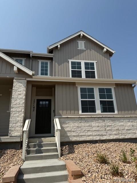 What's Special: End Unit | Close to Greenbelt | Close to ParksNew Construction - Ready Now! Built by America's Most Trusted Homebuilder. Welcome to the Frontier at 17142 W 91st Lane in Trailstone Townhomes, Westerly Collection! This charming end unit invites you in with a welcoming front porch and a spacious open layout. The kitchen features a generous island and pantry, flowing seamlessly into the bright gathering room and cozy dining area. Upstairs, the primary suite offers a peaceful retreat with a walk-in closet and a four-piece bath. Two additional bedrooms, a full bath, and a convenient laundry room complete the second floor. Trailstone combines comfort and convenience with HOA dues that are half the Denver Metro average, stunning views of downtown Denver, Standley Lake, the Rocky Mountains, and easy access to major highways, light rail, and top destinations like Boulder, Golden, and downtown Denver. Residents will enjoy a planned 5-acre amenity center with a pool, pickleball courts, an amphitheater, and walking trails, along with nearby shopping, dining, and entertainment including FlatIron Crossing and Historic Olde Town Arvada. Outdoor enthusiasts can explore over seven miles of scenic trails, five connected parks, a dedicated dog park, and a National Wildlife Certified Pollinator Garden, all within a community that values connectivity and active living. Photos are for representative purposes only. MLS#4366542