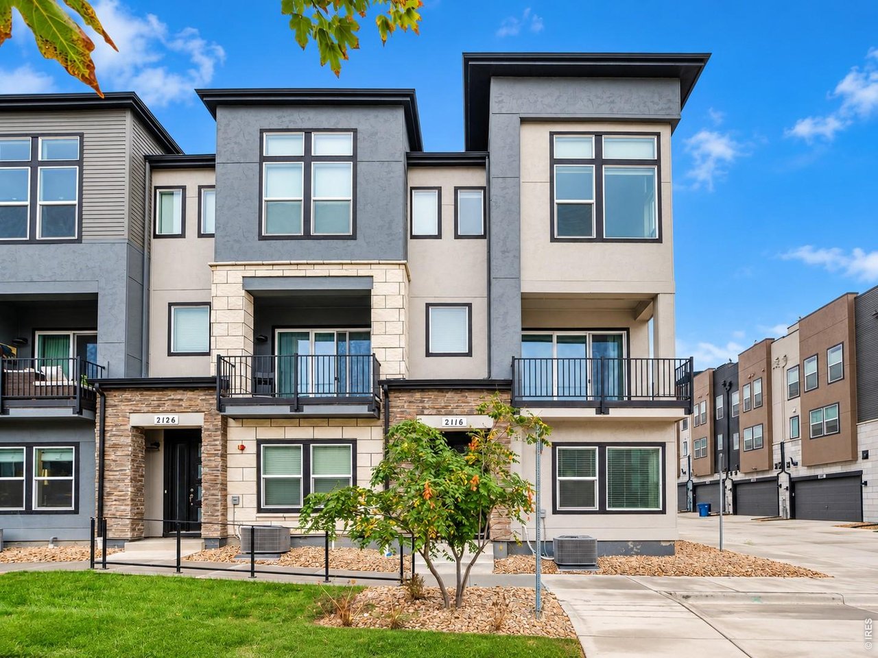 Welcome to this beautifully appointed three-story townhome in Downtown Superior! Situated on a rare corner lot facing a greenbelt, this home offers extra windows, abundant natural light, and enhanced privacy with only one shared wall. All three levels boast breathtaking mountain views of Longs Peak, creating a stunning backdrop for everyday living. Best of all, none of the three bedrooms share a wall with neighboring homes! Featuring 3 bedrooms, 4 bathrooms, 2,096 sq. ft., and an attached 2-car garage, this home combines contemporary finishes with an inviting open-concept layout. The stylish kitchen offers stainless steel appliances, ample cabinetry, beautiful countertops, and a spacious island flowing into the dining and living areas. Enjoy morning coffee or evening relaxation on the private balcony. The primary bedroom boasts fantastic mountain views, while all three bedrooms feature private en-suite bathrooms filled with natural light from multiple windows, a distinctive feature in townhome living. Move-in ready with installed window blinds and included appliances, this home saves buyers the additional expense of outfitting new construction. Enjoy Downtown Superior's vibrant urban lifestyle with shopping, dining, parks, and scenic trails nearby. Easy access to US-36 connects you to Boulder and Denver. EXCITING BUYER INCENTIVE! Qualified buyers may receive a preferred lender credit of up to 1% of the loan amount toward eligible closing costs or temporary or permanent interest rate buydowns, subject to lender approval and program terms. With its rare corner location, greenbelt setting, enhanced privacy, and attractive financing incentive, this home offers exceptional style, comfort, and value. Don't miss this opportunity to experience Downtown Superior living at its finest!