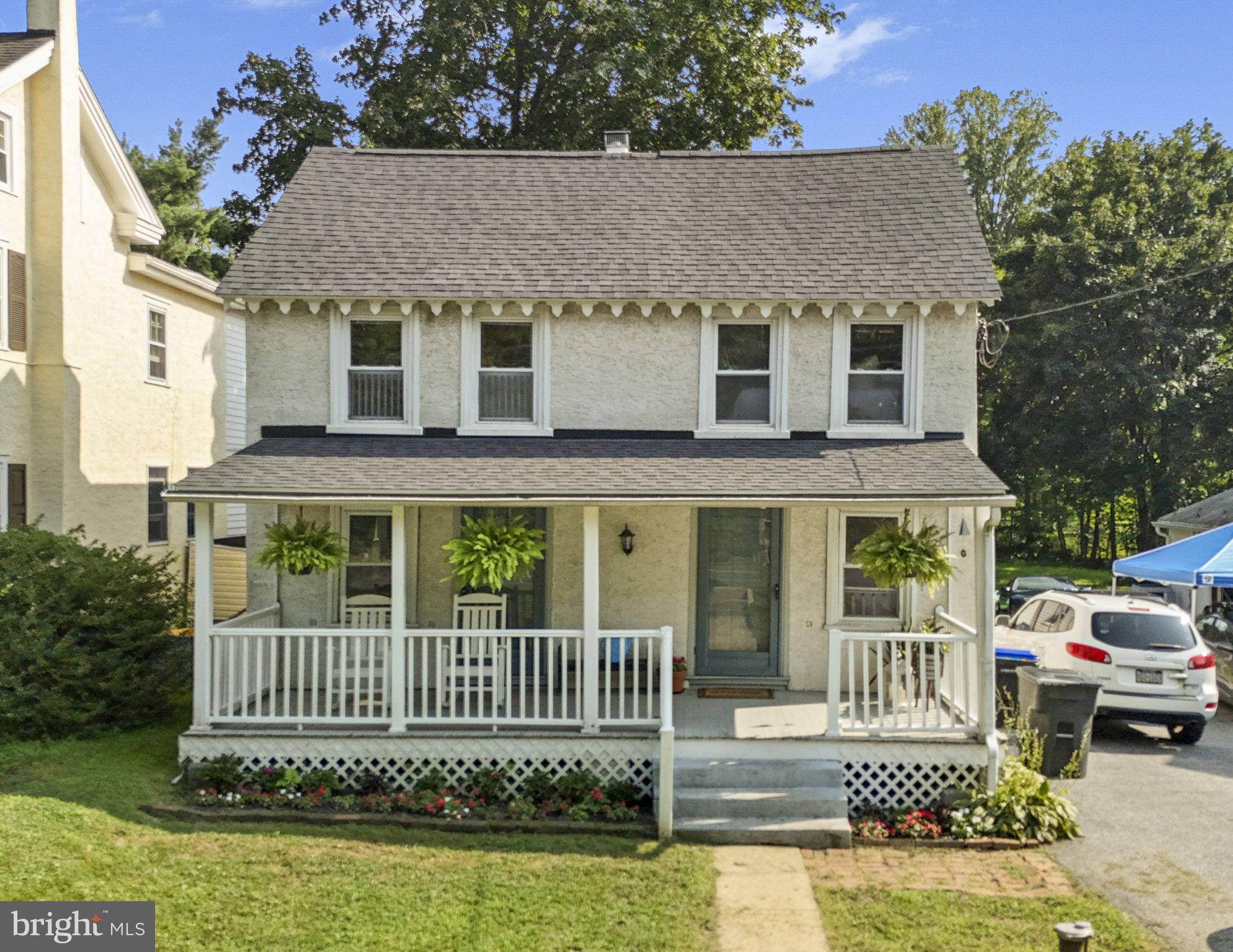 Welcome to 650 Fairview Road! This beautifully maintained 4-bedroom, 3 bath SINGLE FAMILY home blends timeless farmhouse charm with modern functionality. Nestled in a peaceful Glenmoore setting, this home greets you with a large covered front porch and delightful curb appeal. Step inside to find a bright and welcoming main level featuring beautiful hardwood flooring and tons of natural sunlight. The spacious living and dining rooms are perfect for entertaining, and the updated kitchen features cheerful blue cabinetry, a center island with seating, and direct access to the back deck and yard. A convenient main-level full bathroom and laundry area complete the first floor. Upstairs, the primary suite includes a walk-in closet and en-suite bath. Three additional bedrooms share a full hall bath. The unfinished basement offers plenty of storage or potential for future use. Enjoy relaxing on the porch or spending time in the backyard surrounded by mature trees. Updated with a new roof, this home is ready for years of worry-free living. Located in the sought-after Downingtown Area School District with easy access to parks, schools, and commuter routes, this cozy home has it all!