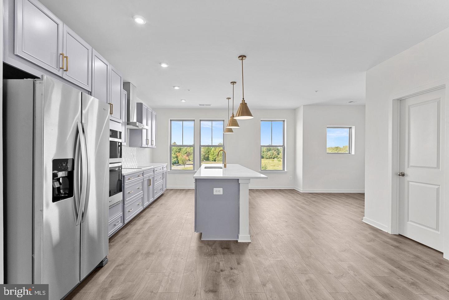 NEW CONSTRUCTION. Special all in price, ready for September move in! Get special pricing and up to $25K in closing costs when using a Choice Lender until 9/16. Welcome to the Hepburn, a brand- new, upscale stacked townhome in the sought-after Belmont Park community in Ashburn, VA. This 2-level home with a 1-car garage is designed for convenience and style—perfect for those ready to move quickly! Featuring 3 bedrooms and 2.5 baths, this home boasts a modern kitchen with 42” cabinets, LED lighting, quartz countertops, and stainless-steel Whirlpool appliances. A generous kitchen island and covered deck invite connection. The spacious primary suite includes a generous walk-in closet and a luxury bathroom with raised double vanities and a walk-in spa shower. Plus, the garage comes equipped with an EV charger-compatible outlet for future-ready living. Enjoy low- maintenance living with snow removal, lawn care, and exterior upkeep all handled for you—giving you more time to enjoy life, not maintain it. Hometown heroes get $2,500 (restrictions apply; see New Home Counselor for details). Belmont Park offers resort- style amenities including bocce ball, volleyball, playgrounds, community greenspace, and more. Located in Ashburn, you’ll have quick access to major roadways, Dulles Airport, and endless dining and entertainment. Beazer Homes at Belmont Park are designed to live better day to day, with energy efficient construction that lowers monthly utility costs, thoughtful design options that make personalization simple, and Mortgage Choice, where our top lenders help you compare options and save money on your home loan. This high-performance home is built to lower your total cost of homeownership through reduced utility bills, durable materials, and high-quality construction that minimizes long- term maintenance costs. Beazer Homes is proud to be America’s #1 Energy Efficient homebuilder. Our FY25 average gross HERS score of 32 (38 excluding solar) was the lowest of the publicly reported scores among the top 30 U.S. homebuilders by volume identified by Builder Magazine’s Top 100 List (based on 2025 total closings). Get protection against rising energy costs without changing how you live. Every Beazer home is pre-wired for solar, making it easier and more affordable to add a renewable system when you are ready. Photos of similar home. Model Home Hours: Mon–Sun, 11 AM–6 PM. Use 19758 Misty Moss Square Ashburn, VA 20147 for GPS directions. Parking will be next to our Information Center trailer. Please go to the model home listed here first.