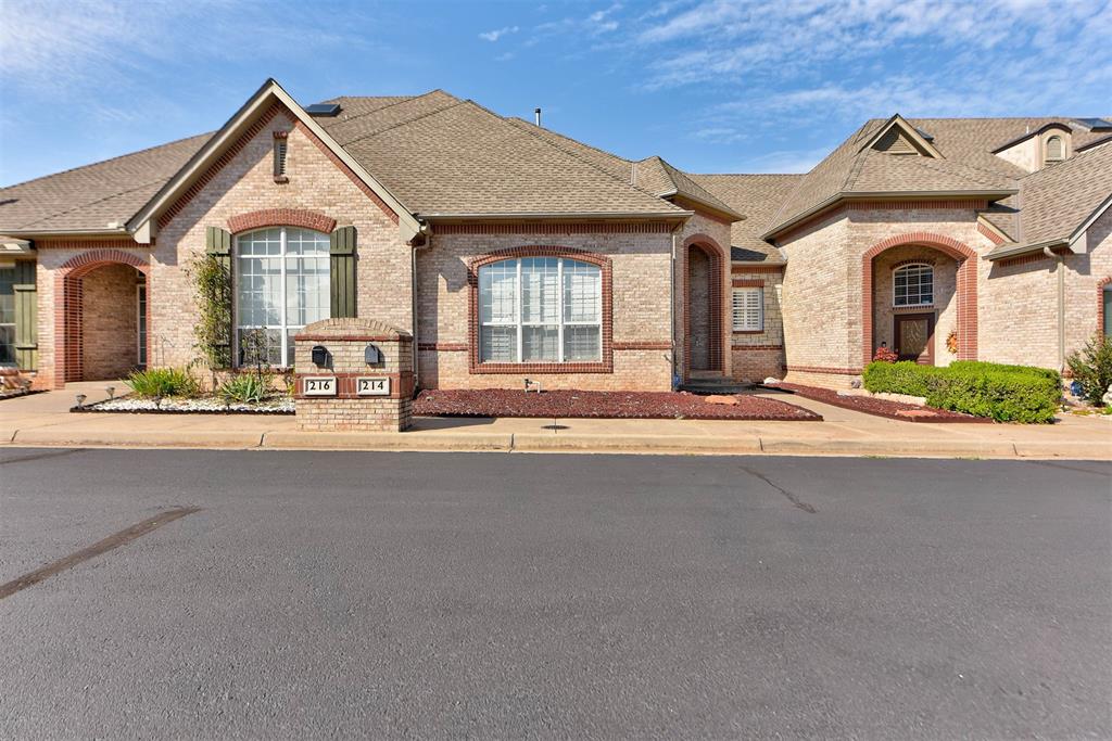 Welcome to Summit Lakes Villas, a gated community in Norman (just a short drive to OU Campus) offering peace of mind and a welcoming sense of community. This two-story home combines comfort and functionality with thoughtful design throughout. Downstairs, you’ll find spacious main living areas including a formal dining room, a cozy breakfast nook, and a generously sized kitchen perfect for everyday living. The large living room features an elegant fireplace framed by built-in bookshelves, creating a beautiful focal point for gatherings or to relax. Upstairs, both bedrooms provide privacy and convenience. The primary suite features dual closets and a well-appointed bathroom, while the second bedroom is complemented by its own nearby bath. With 2 bedrooms, 2.5 baths, and a 2-car garage, this home balances low-maintenance living with plenty of room to spread out. Step outside to enjoy a private patio, ideal for a morning coffee or evening unwind. Residents of Summit Lakes Villas also enjoy access to serene stocked ponds and a charming gazebo just steps from home. And here’s the best part: sellers are offering $10,000 towards closing costs, rate buy-down, or a paint/carpet allowance with an acceptable offer—making this an incredible opportunity to get into Summit Lakes Villas!