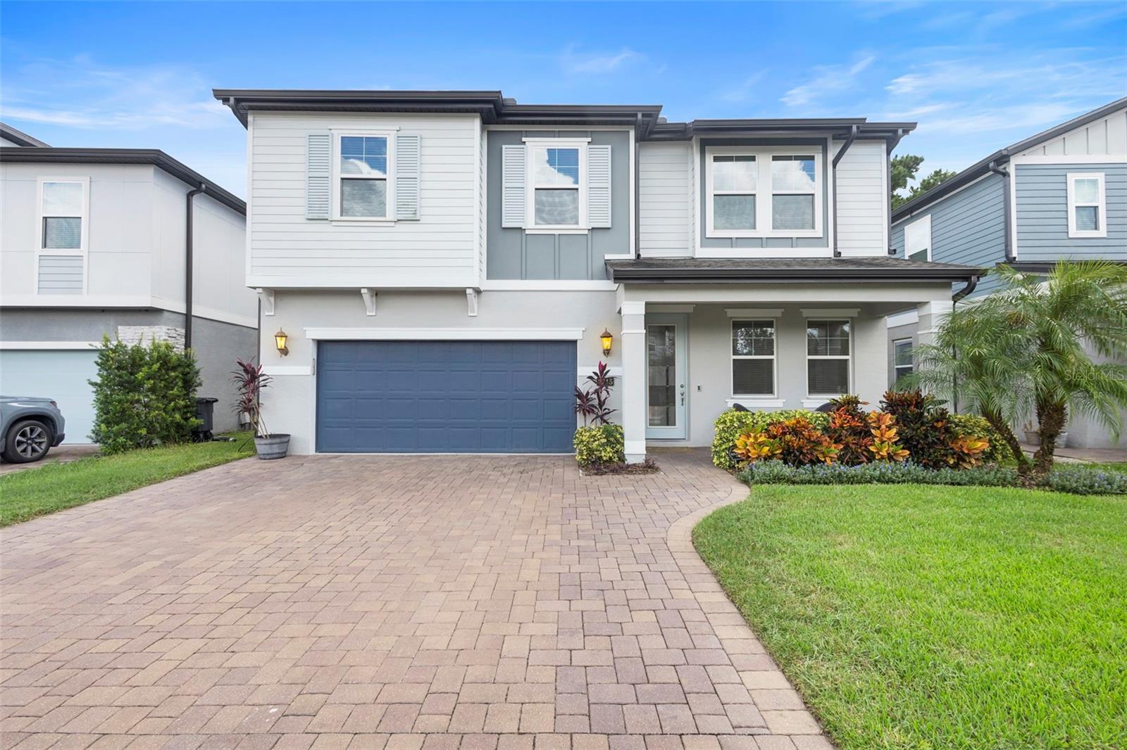 Welcome to the desirable Preserve at Hawks Crest in Winter Park! Discover the perfect balance of space, comfort, and community in this beautiful two-story home at 2215 Marsh Sedge Lane. Featuring 5 bedrooms, 2.5 baths, and over 2,800 square feet of living space, this property offers room to live, work, and play in one of Winter Park’s most sought-after gated communities.Step inside to an inviting open-concept floor plan with high ceilings, abundant natural light, and stylish finishes throughout. The spacious kitchen features Curava countertops (recycled glass) which is eco-friendly and stylish, a large center island, stainless steel appliances, and plenty of storage—ideal for everyday meals or entertaining guests. The living and dining areas flow seamlessly, opening to a covered lanai with a sparkling pool and private backyard, creating the perfect indoor-outdoor Florida lifestyle.Upstairs, you’ll find a generous owner’s suite with a walk-in closet and spa-inspired bath, along with three additional bedrooms and a versatile loft area—perfect for a home office, media space, or playroom.Residents of Hawks Crest enjoy resort-style amenities, including a community pool, clubhouse, fitness center, playground, and scenic walking trails around Lake Howell. The gated entrance provides peace of mind, while the convenient location offers easy access to downtown Winter Park, Park Avenue shopping and dining, top-rated Seminole County schools, and major highways for easy commuting.Whether you’re looking for a peaceful retreat or a home that brings people together, 2215 Marsh Sedge Lane delivers both space and lifestyle. Schedule your private tour today and see why so many love calling Hawks Crest home!