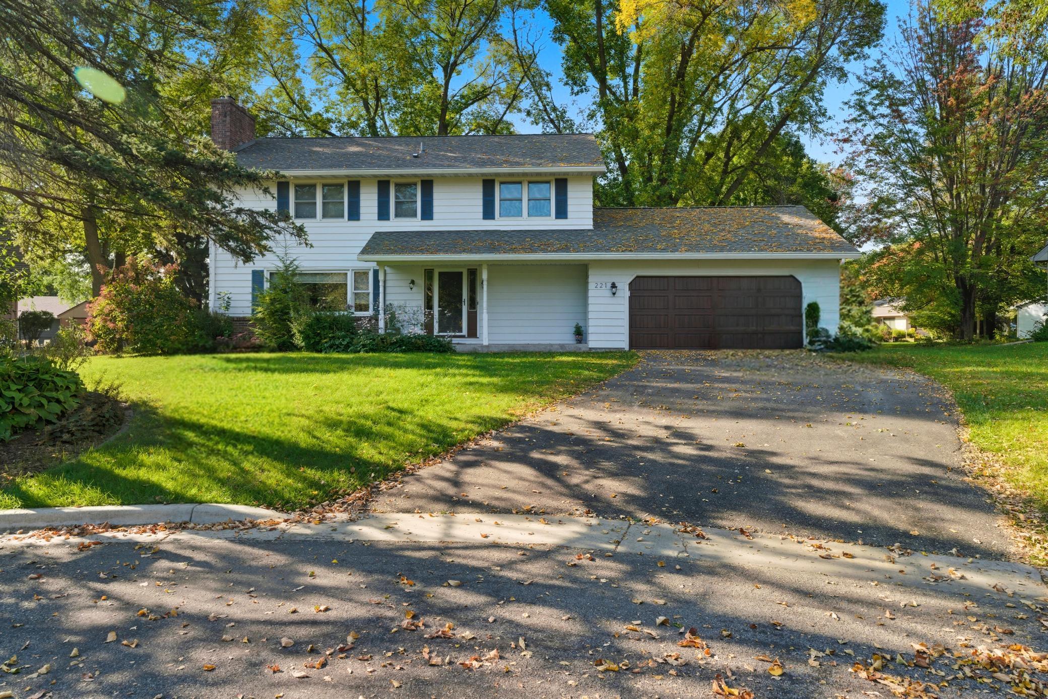 Brimming with timeless charm and curb appeal, this classic 2-story home has been thoughtfully maintained and beautifully updated, offering a warm and inviting atmosphere from the moment you arrive. The main floor welcomes you with a formal living room featuring a brick-surround fireplace, a formal dining room with views of the backyard, and an updated kitchen with granite countertops, tile backsplash, and newer appliances. A spacious family room and convenient half bath add to the comfort, while the screened 3-season porch provides the perfect spot to relax and unwind with an “up north” feel right at home.
Upstairs, you’ll find five bedrooms, including a primary suite with a private ¾ bath, as well as a full bath to serve the remaining bedrooms. The lower level expands the living space even further with a large family/rec room complete with a wood-burning fireplace, laundry area, abundant storage, and a versatile bonus room currently being used as a workout space. The layout offers endless options for living, working, and entertaining.
Major updates include a new roof in 2020, new main-level flooring, and refreshed trim and paint, ensuring this home is move-in ready, with generous closet space & smart storage solutions throughout. Recent updates include fire-rated garage service door & firewall installed, sealed & painted walls in laundry room & workout area of basement, professionally steam cleaned carpets throughout, air ducts professionally cleaned throughout home, new carpet on stairway & some updated electrical items!