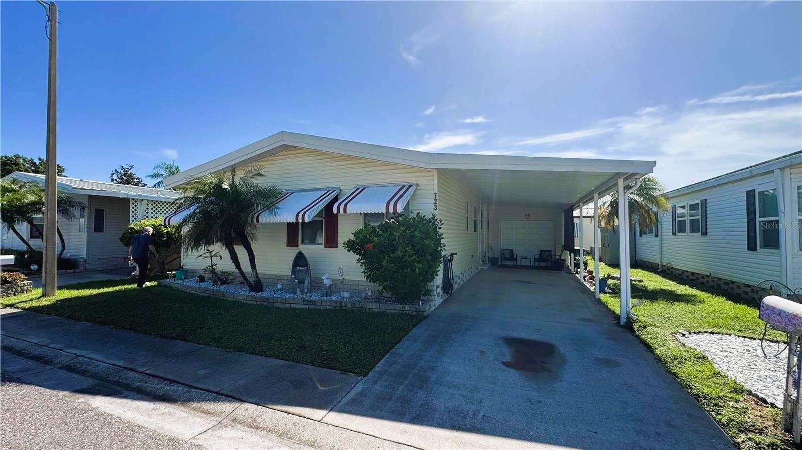 Enjoy peaceful pond views and easy Florida living in this inviting two-bedroom, two-bath home! The open floor plan creates a bright, comfortable space for everyday living and entertaining, while the beautiful view of the pond provides a relaxing backdrop to enjoy throughout the day. Located in a welcoming community with amenities designed for an active, enjoyable lifestyle. Spend your days relaxing by the community pool, unwinding in the spa, or gathering with friends and neighbors at the clubhouse. This is one of the few homes in Paradise Island that also features a one-car garage. Another great benefit is the convenience of having cable, internet, water, sewer, and trash included, helping make monthly expenses simple and predictable. Even better, this home comes with a share valued at $55,000! The location puts you within easy reach of the beautiful Gulf beaches, along with shopping, dining, entertainment, and everything you need for day-to-day living. Whether you're looking for a full-time home or the perfect Florida retreat, this home offers a wonderful combination of comfort, convenience, community, and a beautiful waterfront view.