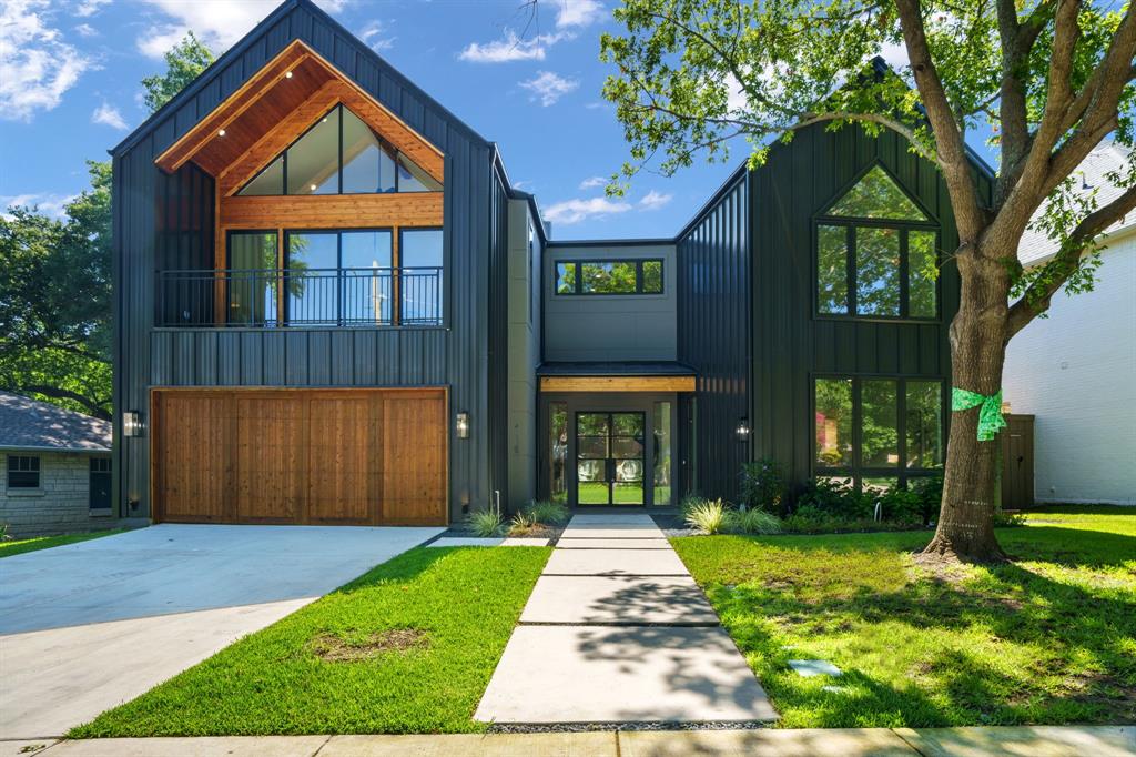 Recently completed, breath-taking 5-bedroom mountain-modern new construction, designed to bring your entertainment dreams to life and house your growing family at the same time! Featuring one bedroom with a private, adjoining bathroom, situated conveniently on the ground floor. The main level also has a generously proportioned, state-of-the-art kitchen that seamlessly flows into the living space. A dual-faced marble fireplace serves as the elegant partition between these two spaces, adding a touch of warmth and grandeur.

Huge game room, with built in bar. An oversized sliding glass door invites the outdoors in, leading directly to the backyard.  The stunning floating staircase to explore the upper level, where a multifunctional open space, featuring a built-in work station, awaits.  An amazing gym space, bathed in natural light streaming through the expansive wall of windows and the glass wall showcasing the downstairs.

The upper level is also home to three additional luxurious bedrooms, each equipped with a private bathrooms. The primary bedroom stands out with its vaulted ceilings, an extensive glass wall that leads to a fantastic , and private covered balcony. This home is a testament to gracious living and entertaining, ready to embrace your family or host your parties with its well-proportioned spaces and thoughtful amenities.