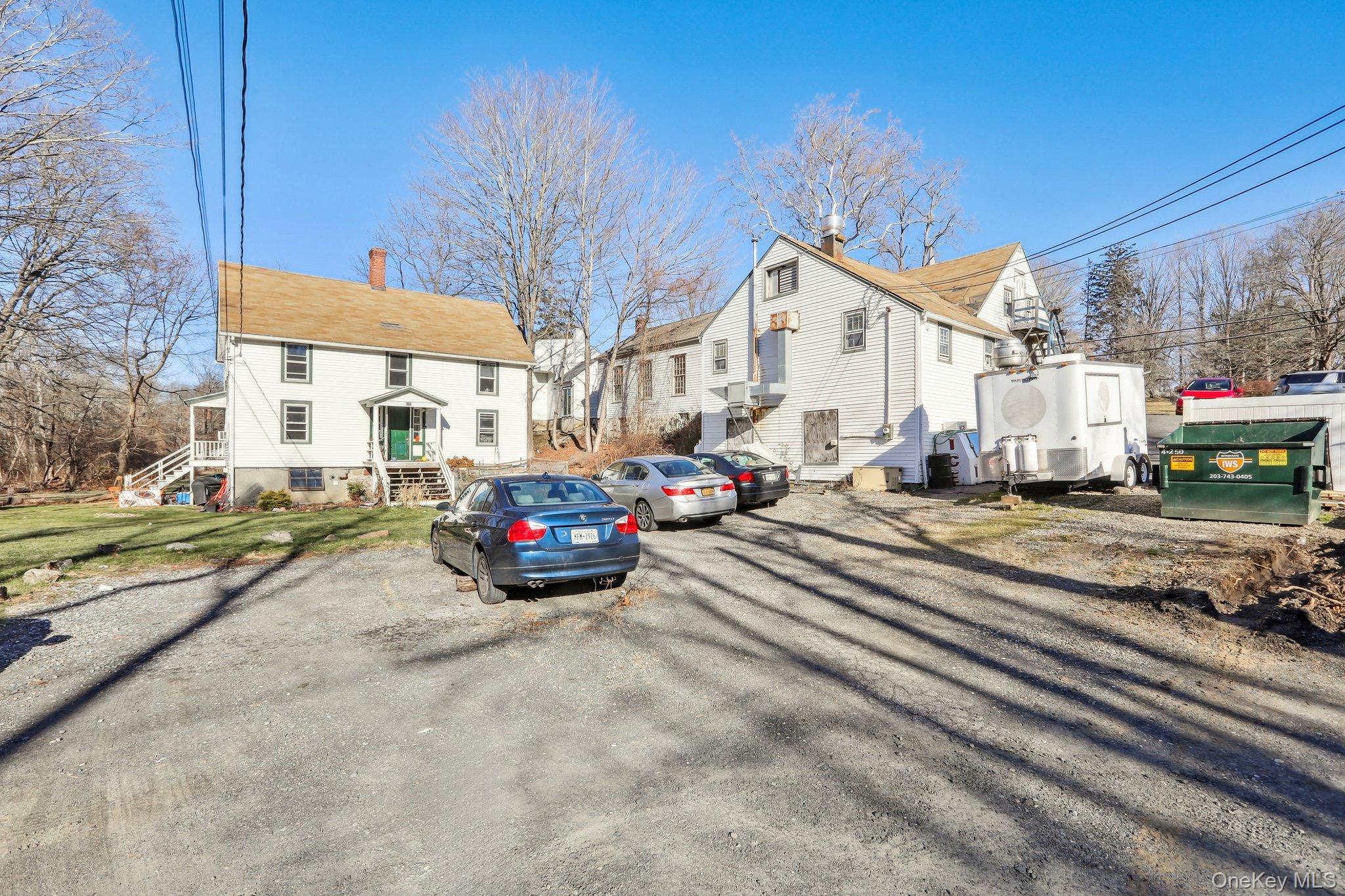 Parcel of 4 Properties: Deli plus 2 Family House, 4 bedroom house w/detached garage. Located in the Hamlet Of South Salem, Surrounded By Green Space. The property is 100% leased. One Car Garage, Lots Of Parking. Super Location. Acreage and Taxes reflect both 112 & 114 Spring Street addresses. Additional Information: HeatingFuel:Oil Above Ground,ParkingFeatures:1 Car Detached