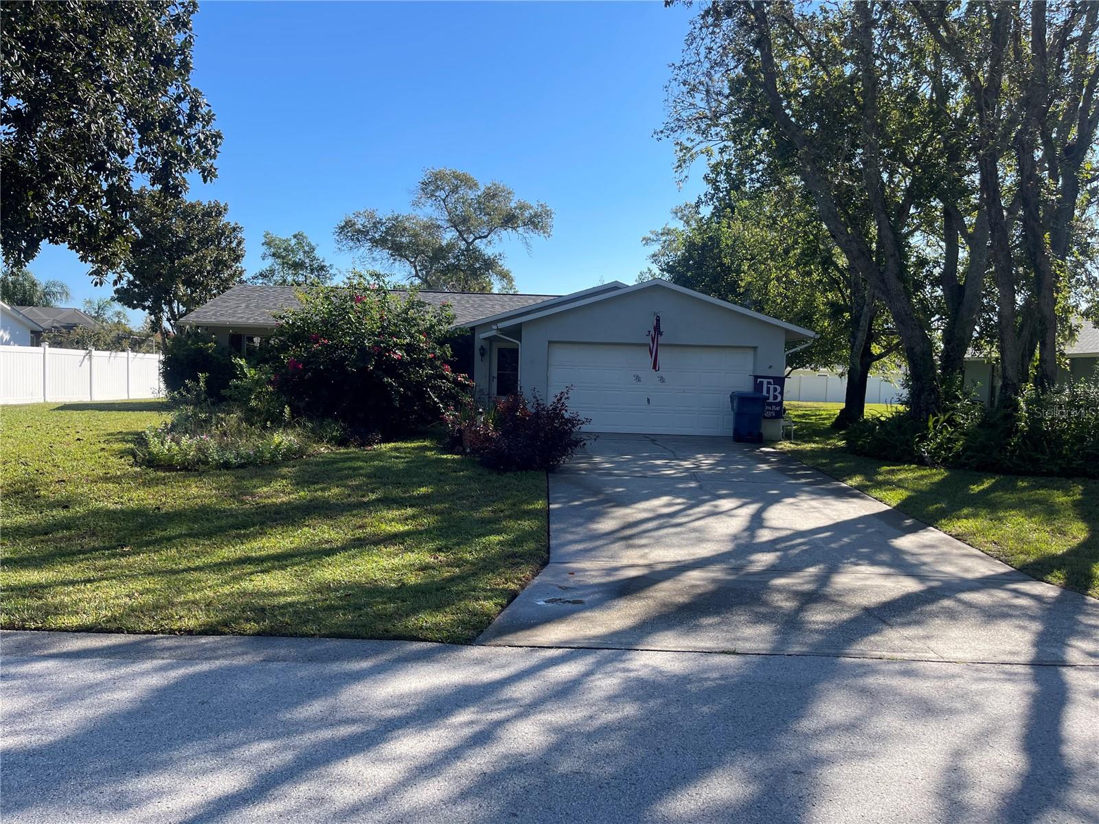 Great potential in Spring Hill! This home boasts a 2-car garage and an in-ground, solar-heated pool. Major update complete: brand new roof installed in 2025! HVAC is working well with recently cleaned ducts. The interior awaits your vision for light cosmetic updates, including paint, carpet, or kitchen. Minor yard cleanup needed in the back. Disclosure: Property has a recorded, unrepaired sinkhole from 2004 with no worsening since then.