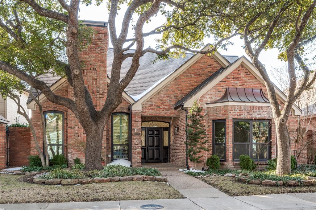 This sought after Prestonwood West home in far North Dallas has been majorly renovated and includes countless upgrades and amenities. From the moment you step inside, you are flooded with natural light from the large windows and open floor plan. You'll be impressed with the 10 ft ceilings, new custom built-ins in the living room and bar area, wood floors throughout the entire house, including the all bedrooms and closets. The Kitchen features new GE Cafe appliances, including a gas range and custom wood hood with white oak detail. The countertops are leathered Taj Mahal quartzite and the custom cabinetry includes under counter lighting and accent lighting in the upper glass cabinets. This home features 3 bedrooms and 2 bathrooms. The Primary Bedroom is spacious and includes a sitting area with lots of light and plantation shutters. The Primary Bathroom has new custom cabinetry with Taj Majal countertop, separate water closet with storage cabinet, free standing tub and spacious shower. There are 2 Living Areas, 2 Dining areas and Bar area with built-in cabinet, quartzite countertop and wine fridge. Guest bathroom features custom vanity with quartzite countertop. Other amenities include plantation shutters at the front of the house, 2 gas fireplaces, new lighting and beautiful lighting fixtures throughout. Front landscaping includes Japanese Maples and private backyard has access from Primary Bedroom and both Living Areas.