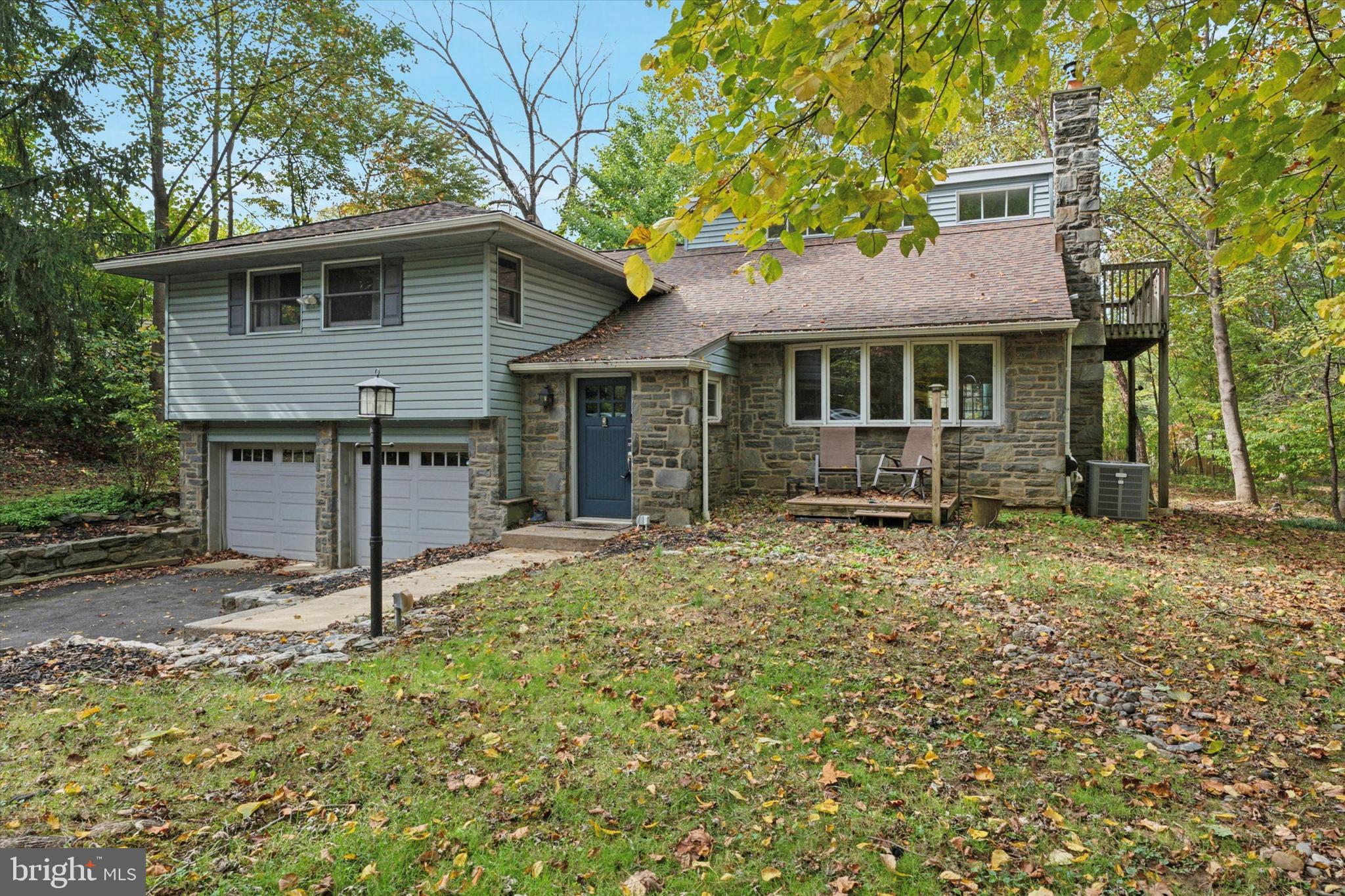 Welcome to 808 Berwyn Baptist Road!  This beautifully maintained 4-bedroom, 3.5-bath home is nestled on a lovely corner lot in the heart of Devon, within the award-winning Tredyffrin-Easttown School District.  Step inside to a bright and inviting foyer with classic molding and built-in shelving. Just ahead, the expansive great room impresses with soaring ceilings, a dramatic wall of windows, hardwood floors, a wood-burning fireplace insert, and custom built-ins — a perfect gathering space for everyday living or entertaining.  The open-concept layout flows seamlessly into a spacious dining area with sliding doors to the back deck and a thoughtfully designed kitchen featuring stainless steel appliances, tile backsplash, and an island with seating,  both stylish and functional.  Upstairs, you’ll find three bedrooms, including one with its own en-suite bath, while the other two share a full hall bath. The private third-floor owner's suite is filled with natural light and includes a walkout deck and a en-suite bathroom — your peaceful escape from it all.  The finished lower level offers even more flexible living space with a second wood-burning fireplace, tile flooring, and a convenient half bath — ideal for a media room, playroom, or home gym.  Enjoy quiet mornings or lively evenings on the spacious back deck overlooking a private backyard — perfect for relaxing or entertaining year-round.  This is a truly special home in a prime Main Line location — close to top schools, shops, dining, and major routes. Don’t miss your chance to call 808 Berwyn Baptist Road home!