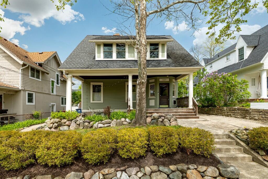 This charming Craftsman-style home is just steps from the Medical Center, Nichols Arboretum, Central Campus, the AATA bus line, and everything downtown Ann Arbor has to offer. A welcoming front porch greets you as you approach the entrance. Inside, you'll find a living room with a fireplace, a formal dining room with a bay window and butler's pantry, and an updated kitchen. Upstairs features four bedrooms and a remodeled bathroom. The fourth bedroom offers access to a third-story loft (not included in the listed square footage) and a full bathroom with a walk-in shower. The current owner has made significant upgrades, including a new block foundation, roof, updated electrical system, many new windows, and renovations to the kitchen and bathrooms. Home Energy Score of 1. Download report at stream.a2gov.org