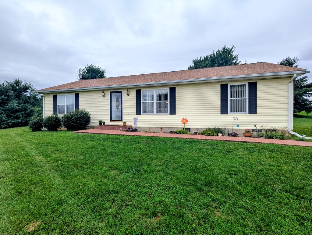 Well-maintained one-owner ranch home for sale in Check, VA! Built in 2002, this home offers approximately 1,344 sq ft of finished main-level living space with 3 bedrooms, 2 full baths, and an added sunroom on the rear of the home. Nearly 3 acres convey, with nice country views as an added bonus. Detached double garage provides great storage and convenience. Recent improvements include a new roof, crawl space upgrades for moisture control, and fresh interior paint throughout. The property is accessed by a private drive maintained through a recorded road agreement with a $100 annual road maintenance fee. Located within 30 minutes or less of Floyd and the New River Valley, VA areas.