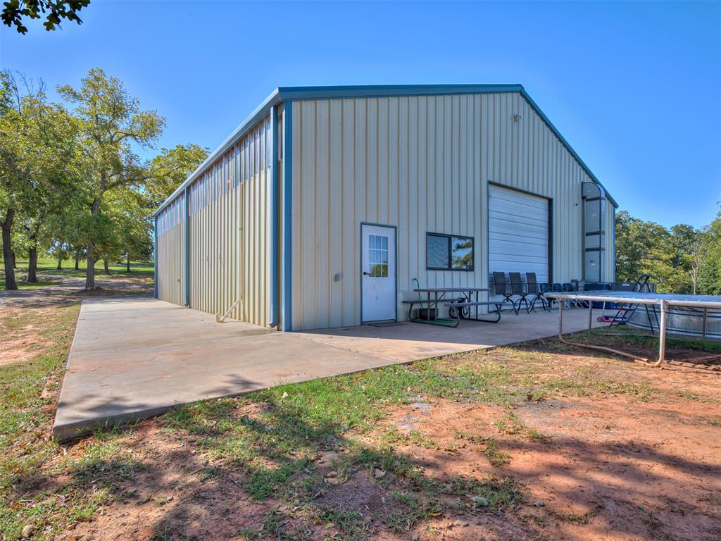Wow what an opportunity to turn this property into your very own little piece of heaven. Frontage on HWY 9, this 10 acres overlooks Lake Thunderbird and has it's own .6 acre pond. OEC electric and fiber, 2 wells and the septic is attached to the 50 X 50 building that has a commercial HVAC system already installed. Finish it out however you want to make it your dream home or retreat!