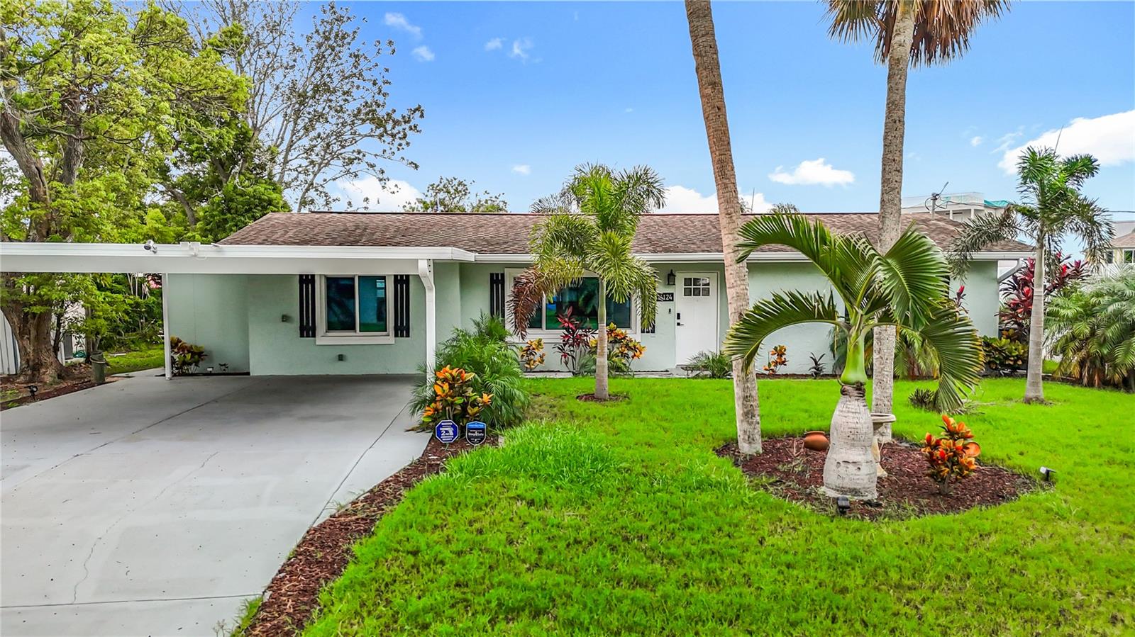MOTIVATED SELLER – Relocation opportunity creates your gain! 4-point & wind mitigation available.

Welcome to 14124 Kulig Ct, a stunning waterfront home featuring authentic Key West-style finishes and deep canal access with direct routes to the Gulf of Mexico. This meticulously renovated property offers true resort-style living year-round, where you can start each morning with coffee on your private dock watching wildlife and water views, then unwind in the evening with wine while enjoying the serene waterfront ambiance.

Step inside to discover a beautifully designed open-concept layout with 3 bedrooms and 2 bathrooms. The chef-inspired kitchen showcases an oversized island with premium finishes and brand new appliances, while the thoughtful split floor plan provides privacy with the primary suite on one side and guest bedrooms on the other. The spectacular Florida room, bathed in natural light from walls of windows, offers breathtaking views of the lush backyard and water frontage, plus an adjacent screened lanai that delivers those authentic Key West resort vibes.

The outdoor space creates a peaceful retreat with professionally designed landscaping and stunning water views from your private dock. Located in a golf cart-friendly community, you'll enjoy convenient access to waterfront restaurants, marinas, bait shops, pristine beaches, shopping, groceries, and all essential services.

This property features impressive recent updates including a roof replacement (2015) with recent clean inspection, HVAC system (2019), new dock (2023), energy-efficient Low-E double-pane windows, brand new washer and dryer that convey, all new appliances, updated water heater, and new gutter system (2025). All improvements were completed by licensed and insured professionals with Pasco County Building Department approval. The transferable flood insurance provides additional peace of mind.

Whether you're seeking a family sanctuary, vacation retreat, or exceptional Airbnb investment opportunity, this hidden gem delivers luxury waterfront living with resort-style amenities. Schedule your private showing today and discover all this charming waterfront paradise has to offer!