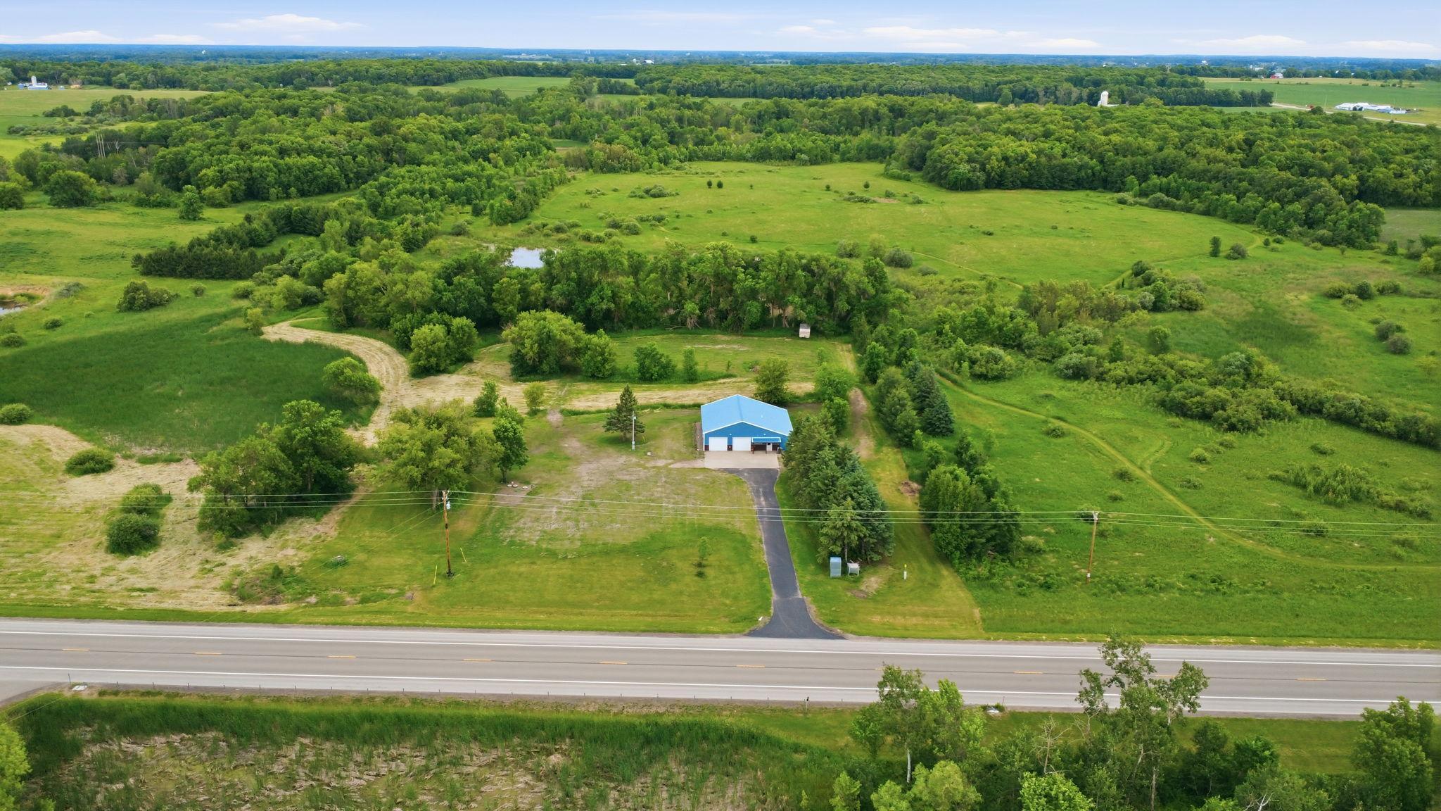 Enjoy country living with room to roam at this unique 3-bedroom, 1.75-bath shouse situated on 8+ private acres at 18716 Highway 27. Offering approximately 1,560 square feet of living space, plus an insulated 24' x 24' two-stall garage with epoxy floor and an 8' x 32' seasonal porch, this property provides endless possibilities for full-time living, a weekend getaway, or a recreational retreat.Recent improvements include addition of living space, epoxy garage floor, a new furnace, central air conditioning, water heater, and updated plumbing and electrical systems, giving buyers added peace of mind. The spacious seasonal porch offers excellent potential to be converted into additional year-round living space. Two RV/camper hookups make it easy to host family and friends or accommodate outdoor enthusiasts. The property's 8+acres offer privacy, abundant wildlife, and excellent potential for a deer food plot. Located near numerous lakes, you'll enjoy easy access to fishing, boating, and year-round outdoor recreation. Conveniently situated between Long Prairie, Osakis, Sauk Centre, and Alexandria, this property combines the tranquility of country living with access to nearby amenities.Whether you're looking for a growing family home, hunting headquarters, weekend retreat, or peaceful rural lifestyle, this versatile property is ready to meet your needs.