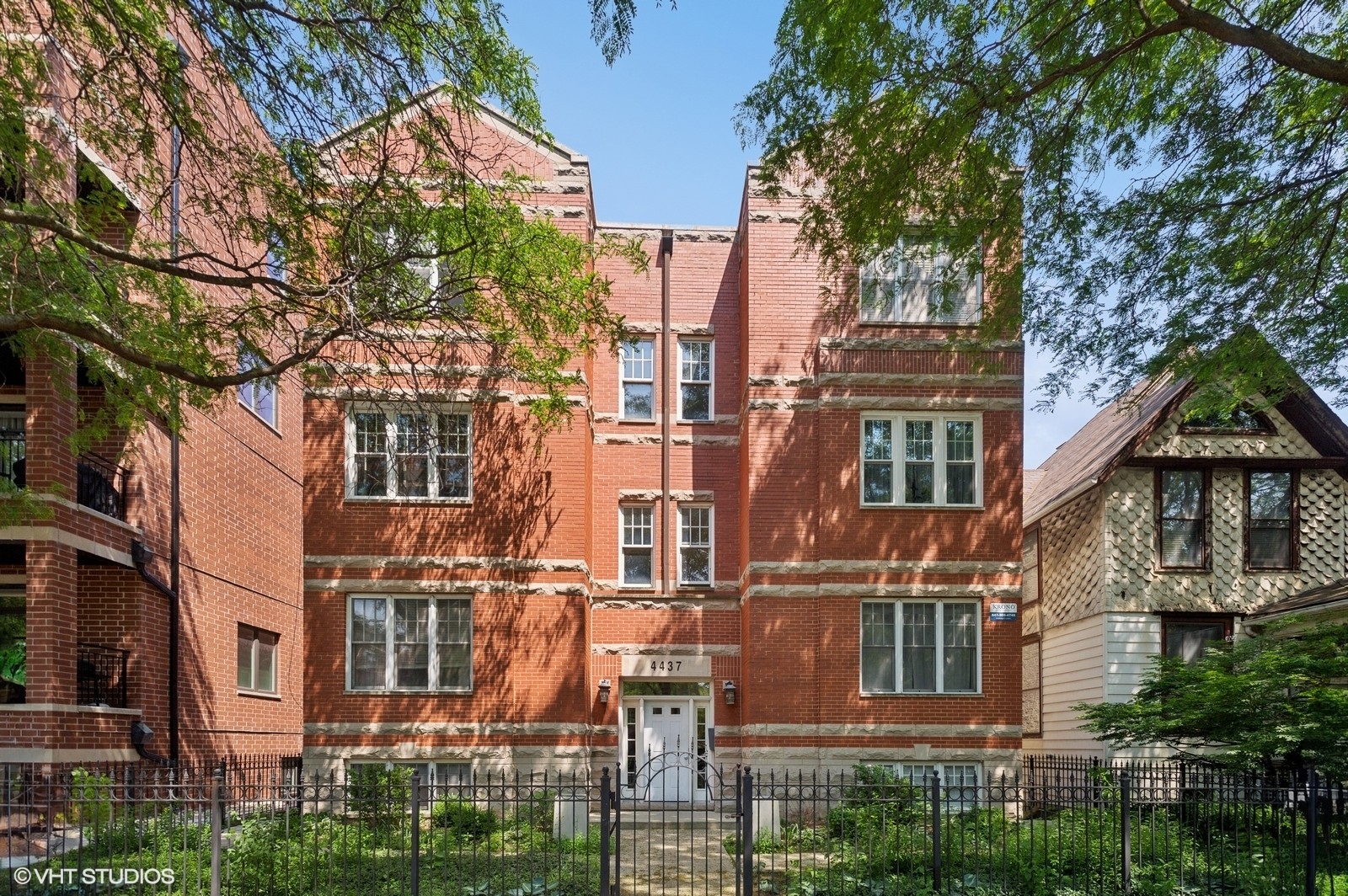Discover the space, style, and neighborhood charm you've been searching for at 4437 N Ashland Ave, Unit 2S - a meticulously maintained, extra-wide 3-bedroom, 2-bathroom home tucked into the heart of Ravenswood, one of Chicago's most beloved and connected neighborhoods. Step into a sun-drenched layout where hardwood floors, oversized windows, and a cozy gas fireplace set the tone for both relaxed living and effortless entertaining. The kitchen is thoughtfully designed with stainless steel appliances, granite countertops, a large breakfast bar, and ample storage, making meal prep easy and everyday living seamless. The primary suite is complete with a walk-in closet and a private en-suite bath. Two additional bedrooms offer endless flexibility - perfect for a home office, nursery, or guest space. Start your day or wind down on your private back balcony, a quiet outdoor escape perfect for your morning coffee or evening glass of wine. A rare walk-in laundry room, central HVAC, and gated parking add everyday convenience, while a well-run, intimate building with strong financials gives you peace of mind.  Steps from the Montrose Brown Line, Ravenswood Metra, Mariano's, and an array of local favorites including Lincoln Square, Andersonville, and Southport Corridor. You're also minutes from Wrigley Field, lakefront trails, and nearby parks - everything you love about city living, right at your doorstep. This is more than a home - it is your chance to live with space, style, and connection in the heart of Chicago. Don't let it slip away.