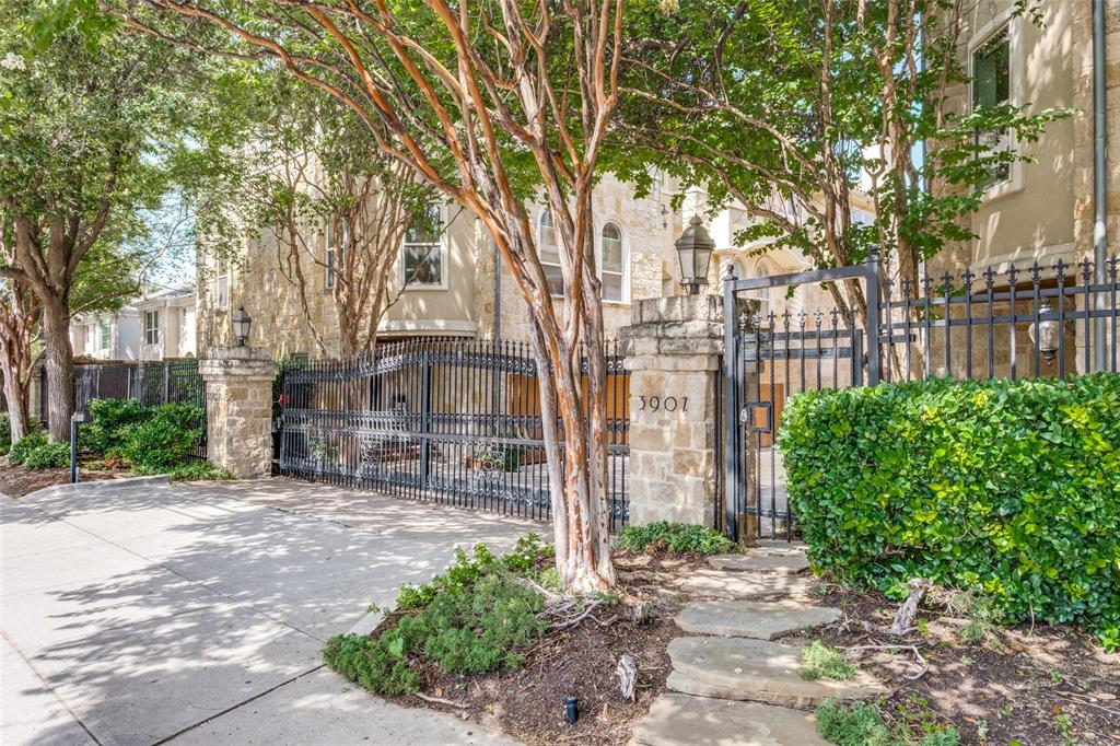 The location is second to none—just one block from West Village, directly across from a large city park, and only a few blocks from the Katy Trail, placing Dallas' best shopping, dining, entertainment, and outdoor recreation right at your doorstep.Designed for both everyday living and entertaining, this spacious residence offers 3 bedrooms, 3.5 baths, a private backyard, and an expansive rooftop deck—creating multiple indoor and outdoor spaces to relax and gather. Venetian plaster walls throughout the entry and second floor add warmth, texture, and architectural character, while rich hardwood floors and abundant natural light enhance the home's inviting atmosphere.The open-concept second floor features a spacious living area anchored by a gas fireplace that flows seamlessly into the dining room and chef's kitchen. The kitchen is equipped with stainless steel appliances, granite countertops, abundant cabinetry, and a walk-in pantry, making it as functional as it is beautiful.The oversized primary suite is a private retreat featuring a spa-inspired bath with dual vanities, a soaking tub, separate walk-in shower, and a generous walk-in closet. Two additional ensuite bedrooms provide exceptional flexibility for guests, family, or a home office, while the convenient powder bath is ideal for entertaining.From morning walks on the Katy Trail to dinner at West Village and evenings on your private rooftop deck, this home offers the perfect blend of timeless style, exceptional outdoor living, and one of Dallas' most desirable walkable locations.