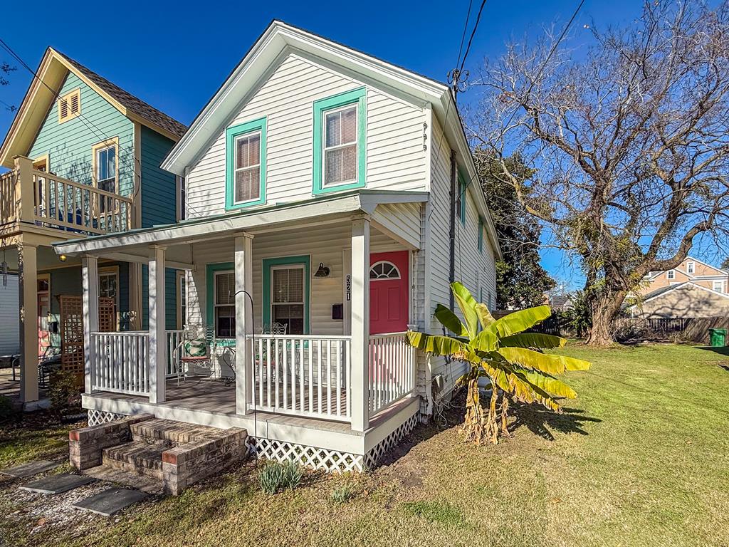 Instant opportunity as turn-key beach house and/or vacation rental! This 2 bedroom 1.5 Bath house, located in downtown Cape Charles, is only a short stroll from the shops, restaurants and our picturesque beach on the Bay. Fully furnished! The house has front & back porches, along with a balcony and outdoor shower. There is ample room for adding a side driveway and a garage. Recent 2024 upgrades/improvements include: new floors throughout 1st flr; whole house interior paint job; new tankless water heater; and the addition of an outdoor shower for that open air feel and the quick rinse after returning from the beach.  This gem is waiting for you to move in and start to enjoy yourself.