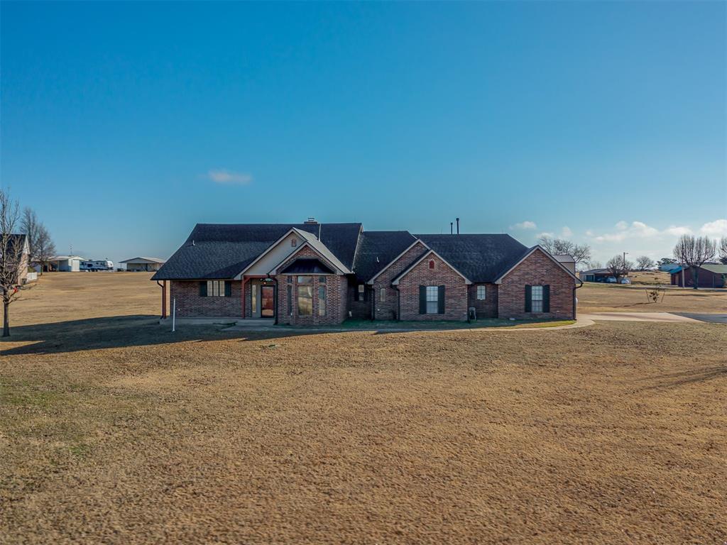 Located in Deer Creek Schools, this beautiful 3-bedroom, 2.5-bath home with a dedicated study sits on 3 acres and includes an impressive 30x60 shop with RV power hookup. Enjoy a beautiful view from the front porch while taking in the peaceful surroundings. The split floor plan offers privacy for the primary suite, which opens to the covered back porch, perfect for relaxing or entertaining. The kitchen features granite countertops, soft-close drawers, a pot filler, and flows into the eat-in dining area. The spacious living room is ideal for everyday living. The study near the front entry includes extensive built-ins, making it perfect for a home office or flex space. Additional highlights include a 3-car attached garage with extra storage, newer water heaters, new plumbing lines, a new driveway, and a roof that is only 2 years old. The 30x60 detached shop offers endless possibilities for hobbies, storage, business use, or recreational vehicles. With paved road access to the house, shop, and acreage, this property combines convenience with country living.Don’t miss your opportunity to call this place HOME!