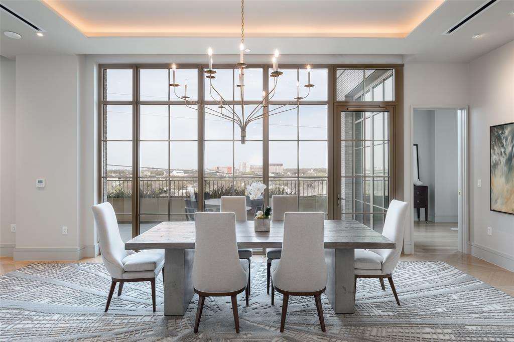 This exquisite home in The Terminal at Katy Trail was designed by acclaimed interior designer Gonzalo Bueno of X+III and is one of only three combined units in the building. The residence occupies the entire west side of the fifth floor, with views of downtown, the Katy Trail, and the Knox Street area. The expansive floor plan provides large open living areas with multiple seating areas and a wet bar for sophisticated entertaining. The dining room opens to a 499-square-foot-terrace overlooking the Katy Trail. The gourmet kitchen is well-equipped with Miele appliances, including a gas range. The spacious primary suite with downtown views includes a sitting area, a beautifully appointed bathroom opening to a terrace, an enormous closet, and coffee bar.  Three secondary bedrooms are located on the north end of the residence, all with en-suite bathrooms and large closets. There is also a study with views of the Katy Trail. The Terminal at Katy Trail, designed by Austin-based architect Michael Hsu, also offers fabulous amenities such as yoga, Pilates, delicious dining options, 24-hour concierge, valet, and a state-of-the-art health and wellness day spa.