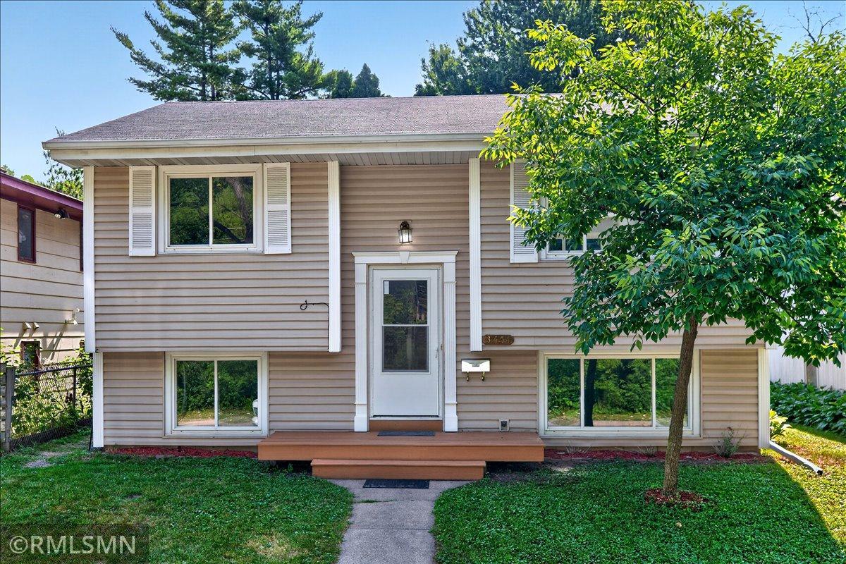 Welcome home to this beautifully updated home. The kitchen, featuring new granite countertops, stainless steel appliances, and luxury vinyl plank floors, seamlessly connects to the dining and living rooms. The bathrooms have undergone tasteful renovations, and the entire home now boasts new carpeting, lighting, and paint. Nestled on a quiet street, this home is just minutes away from the charming downtown Robbinsdale, offering a delightful array of shops and restaurants. Additionally, it provides easy access to downtown Minneapolis. This move-in-ready home is a dream come true, requiring no effort on your part!