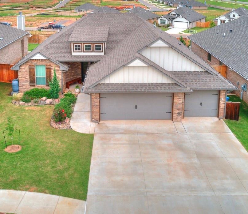 Absolutely gorgeous , like new home in the desirable Woodland Park neighborhood (swimming pools/clubhouse/fitness center/playground/walking trails…)of Edmond. This home has it all from the meticulous landscape of the exterior including the large covered back patio w/fireplace to the immaculate interior open floor plan including 4 bedrooms (3 bed+ study)/2 bath interior. You’ll love the layout which includes a large center island with floor to ceiling cabinets, pantry, dining space for large table, lots of windows for natural light and spacious master/spa area. Other amenities include tankless water heater, storm shelter , irrigation and so much more. This one is well priced and very well taken care of…..schedule your showing quickly.