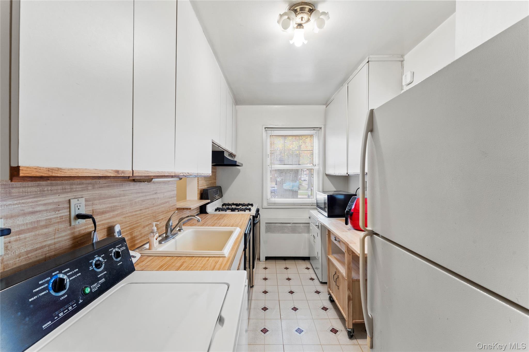 Lovely 2/3 Bedroom Lower Corner Unit Located on a Beautiful Tree Lined Street in Deepdale Gardens. This Bright South Facing Co-op Features Nicely Maintained Kitchen with Plenty of Cabinetry, Including Large Pantry Cabinet, Space for Eat-in Table or Breakfast Bar, Ultra Convenient Washer, Dryer and Dishwasher, Opened Kitchen Wall Pass Through and Two Corner Windows Making Meal Preparation a Delight. Two Large Sized Bedrooms, and Formal Dining Room that Can Also Be Converted to a 3rd Bedroom. Primary Bedroom with Very Rare Double Closets, Spanning Entire Wall for Great Bedroom Closet Space. Additional Features Include Large Living Room with Walk-In Closet for Extra Storage Space, Recessed Lighting, Crown Molding & Convenient Access to Additional Parking Lots Nearby. Current Monthly Maintenance Includes All Utilities (Including Electric), Taxes & Parking. No Flip Tax. Close To All Shops, Schools & Transportation.