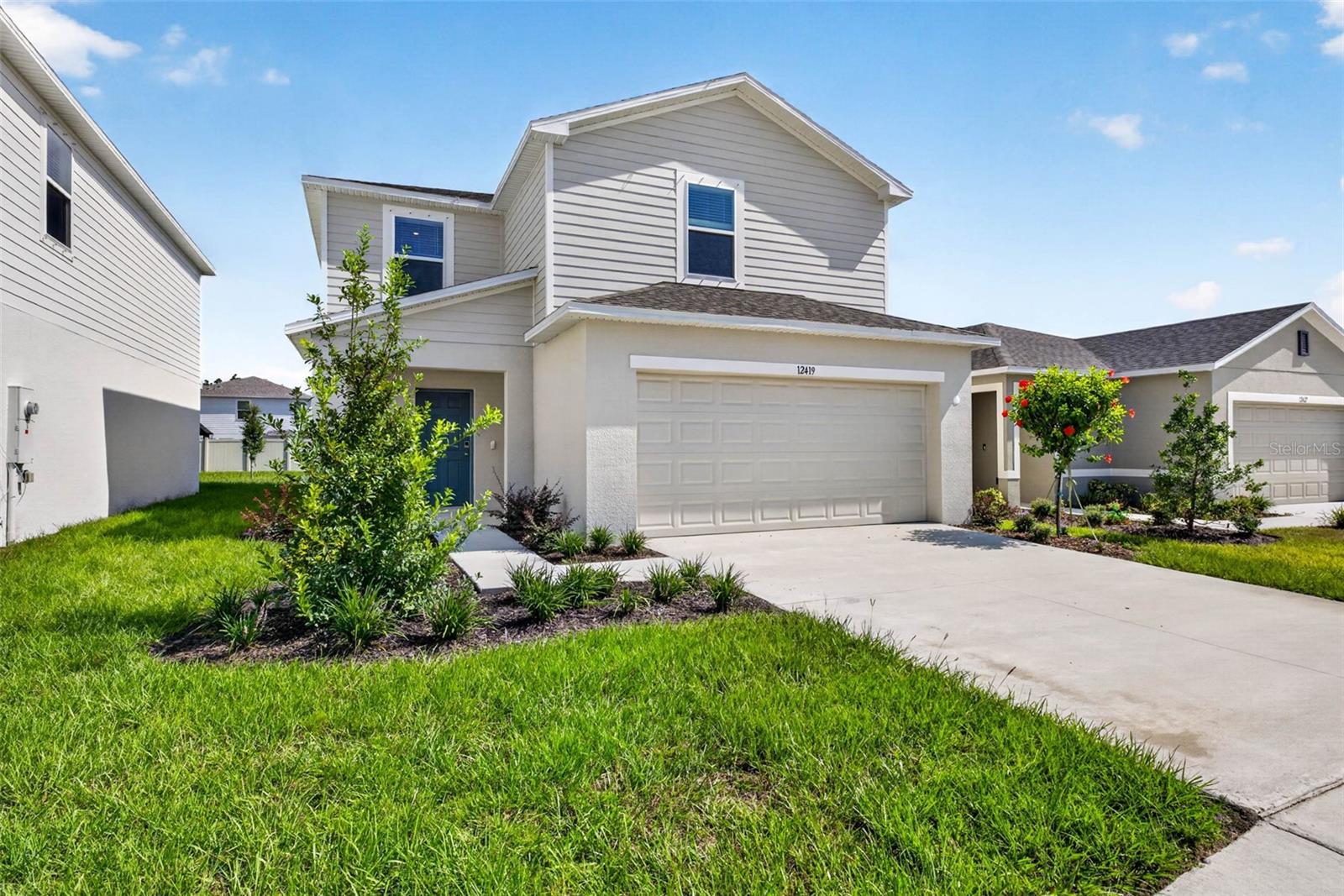 WHAT'S SPECIAL: Cul-de-Sac Lot | Larger Backyard | North-Facing Patio | Popular Plan | New Construction – Ready Now!Welcome to 12419 Gust Court in Palm Wind—where new construction, thoughtful design, and an exceptional homesite come together.This beautifully designed Maple floor plan offers a welcoming open-concept layout with the great room flowing seamlessly into the dining area and kitchen, creating a bright and connected space that is equally suited for everyday living and entertaining. The kitchen features quartz countertops, a center island, and stylish tile flooring that continues throughout the main living areas.Just off the foyer, a convenient powder room adds functionality, while sliding glass doors lead to the patio and the larger backyard, providing additional outdoor space to enjoy.Upstairs, two comfortable secondary bedrooms share a full bath and are conveniently located near the laundry room. The spacious primary suite offers a private retreat with an en-suite bath and generous walk-in closet—creating the perfect place to unwind at the end of the day.And the homesite itself is a standout. Situated on a cul-de-sac lot with a larger backyard and north-facing patio, this is an especially appealing setting for enjoying outdoor living.Palm Wind in Hudson, Florida, combines a welcoming neighborhood atmosphere with convenient modern amenities. Planned community features include a pool, cabana, tot lot, open lawn, butterfly garden, and dog park, while Hudson's coastal character offers natural beauty, outdoor recreation, and the relaxed charm of Florida's Nature Coast.Additional Highlights Include: GE refrigerator, washer and dryer, and whole-house blinds.Brand-new construction. A desirable Maple floor plan. A cul-de-sac homesite with a larger backyard. And it's ready for you now.