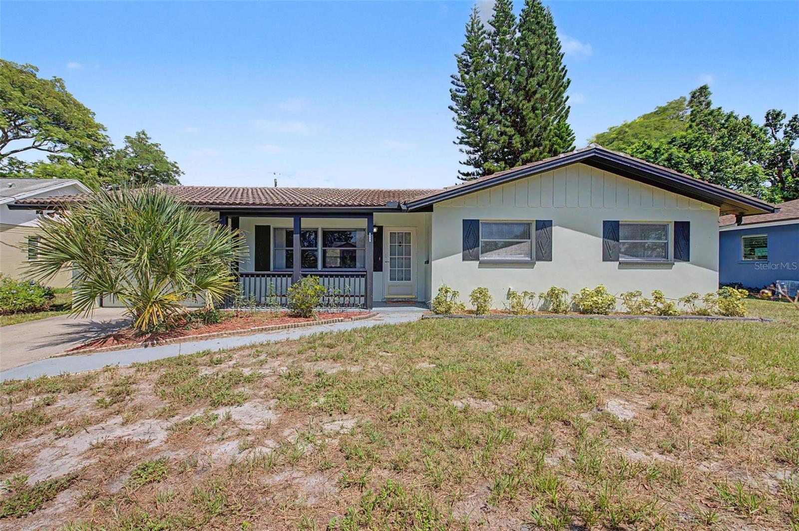 Brand New A/C October 2026. This 3-Bedroom 2-Bathroom, Dunedin charmer comes complete with a tastefully updated kitchen, vinyl plank flooring, family room with free standing fireplace and a nice sized fully fenced backyard. Great layout with a spacious living room, both bathrooms have been updated and the family room makes a great flex space that works well for entertaining, hobbies, or a dining area. Kitchen updates include nice cabinets, quartz counter tops and stainless steel appliances. Located just minutes from bustling Main Street in Downtown Dunedin with lots of shops, dining and entertainment. Enjoy easy access to top rated Honeymoon Island State Park. Solid build block home in a NO FLOOD ZONE.