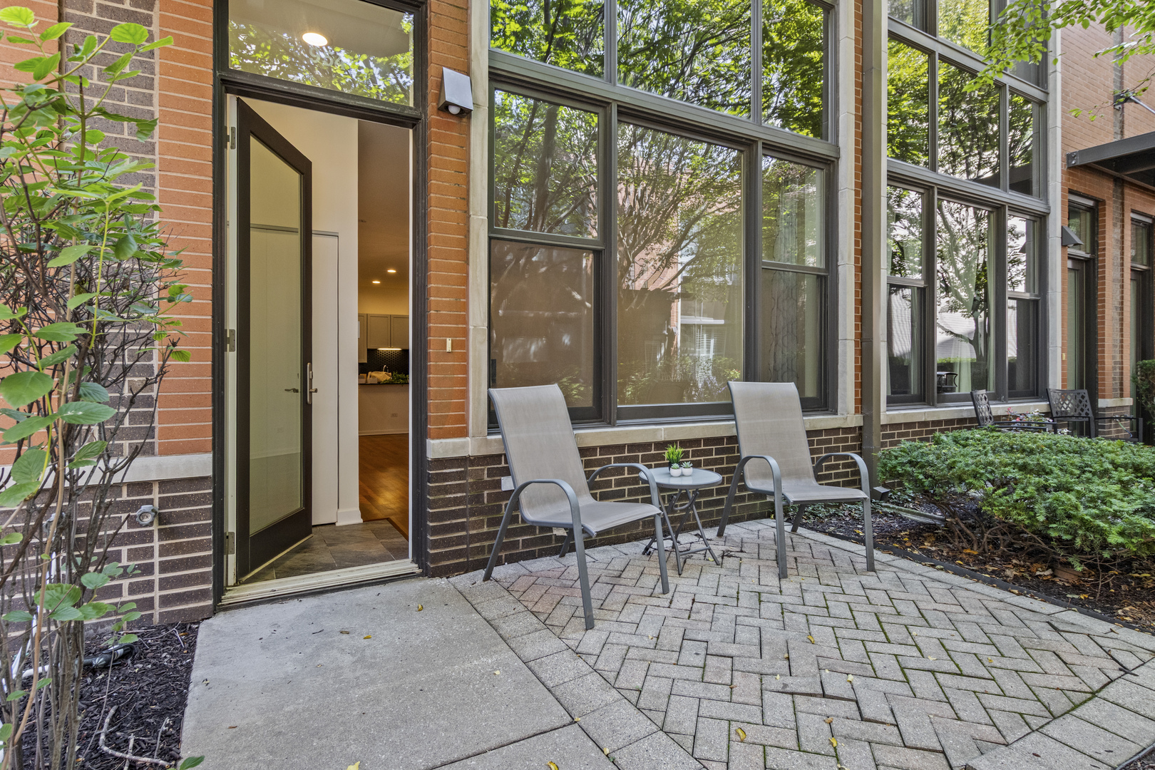 Beautiful 2 Bed / 2 Bath Townhome with Private Rooftop | River North.  Welcome to this beautifully updated and spacious townhome located in the heart of River North. The open-concept main level features a modern kitchen with stainless steel appliances, newly resurfaced hardwood floors, and a bright living area with oversized windows that flood the space with natural light. Enjoy cooler evenings in front of your beautiful gas fireplace. Upstairs, you'll find two bedrooms and two full bathrooms, including a comfortable primary suite. Both bedrooms can accommodate a king size bed. Step out onto your private rooftop Trex deck-ideal for relaxing or entertaining. Recent Updates Include: - Entire home freshly repainted - Refinished hardwood flooring - Refurbished kitchen cabinets - Brand-new backsplash, faucet and disposal - Newly carpeted stairs and second floor - New Trex rooftop deck (2024)  Additional Features: - In-unit laundry - Kitchen pantry - Ample closet space - Dedicated underground/enclosed parking space and storage. Located just blocks from River North's top dining, shopping, and entertainment options. A fantastic location!