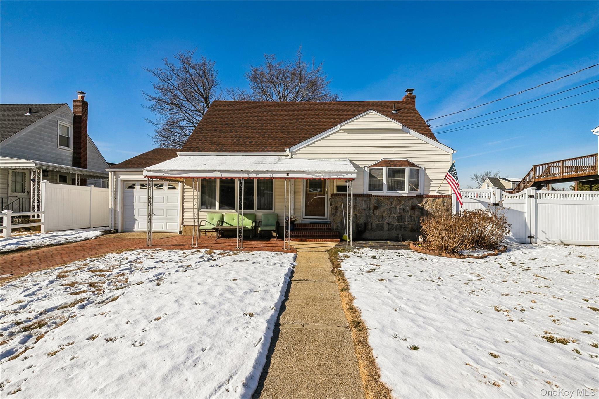 Great potential on this middle of the block cape on extra wide lot!! {80x100}. Room for and plumbing for 2nd bath on second floor. Hard wood floors, 5 yr old roof,200 amp electric, 10 yr old appliances, 10 yr old boiler. Taxes include 20x100 lot A must see!!
