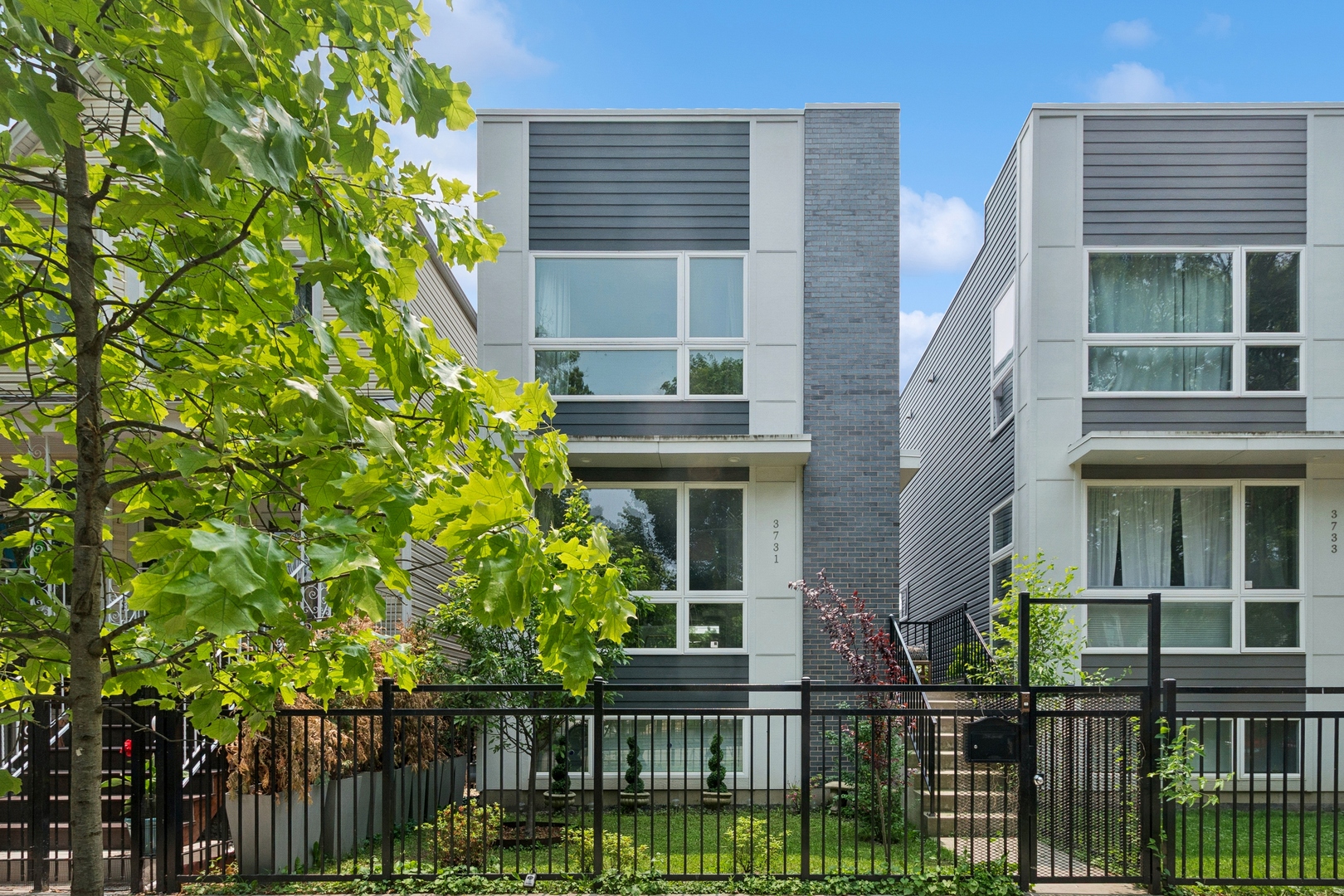 Huge Price Improvement on this Logan Square newer construction home by the esteemed MK Construction builders. Three floors of luxe living space, and so many high-end upgrades throughout. First floor highlights include an electric fireplace and with marbled quartz surround, a custom herringbone-tiled powder room, an eat-in kitchen with island, dual coat closets and walk-in pantry, and white oak floors throughout. Second floor has three nicely sized bedrooms including a huge primary suite & bath with heated floors. Super comfy lower level with family room, an additional full bath with Missoni wallpapering and fourth bedroom, currently used as a home fitness space. Step out to the deck and yard with full privacy fencing + over $40k of landscaping upgrades to create your private backyard sanctuary, complete with spacious two-car garage. An urban oasis just blocks to Armitage Ave dining and shops, Logan/Palmer Square, the 606 and more.