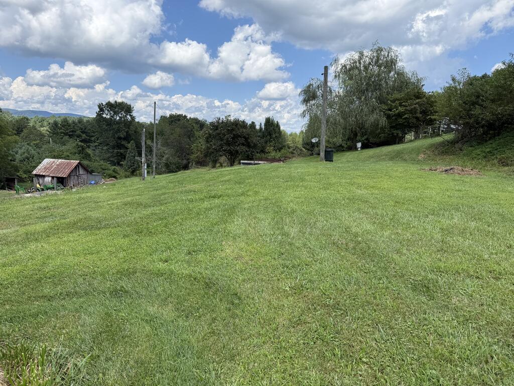 Half acre lot. Unrestricted with well  and septic. Paved road frontage.  Close and convenient to the New River, minutes to the quaint little Mill town of Fries, Va.