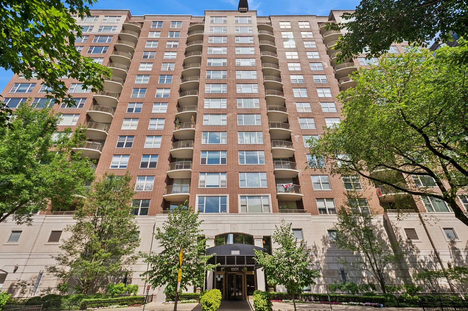 Enjoy fabulous views from this beautifully remodeled home in the heart of the Gold Coast! This is an end unit in the preferred tier featuring two balconies offering views in every direction! "The Whitney" is a well-maintained and professionally managed building  offering an exemplary 24/7 door staff, exercise room, party room, and sundeck.  This elegant home has been fully renovated over the last few years with timeless design elements. You will find beautiful  custom millwork throughout in the form of built-in cabinetry. The well-thought-out kitchen was remodeled in 2019 with Bosch, and Thermador appliances, 4" thick quartz countertops, soffit lighting, built-in spice cabinets, wood cabinetry and deep pull-out storage drawers.  Luxurious motorized shades were installed throughout!  The kitchen window brings in light and views overlooking mansions and beautiful trees. The combination living/dining room is encased in a wall of windows through which glorious sunsets dance nightly. The west wing features the primary bedroom with two generous walk-in closets, and another closet. The primary bath is stunning in soft neutrals featuring Kohler fixtures, and an over-sized step-in shower. A secondary suite sits across from a full bath with dual vanities, Kohler fixtures and tub/shower combination. The third bedroom doubles as a guest room, or family room.  The walk-in laundry with full size washer/dryer doubles as pantry, or additional storage. There are two additional storage rooms: one in unit, and another private one in the corridor.  The seller is conveying two parking spaces  with a value of $45,000 each in this neighborhood. There are electrical outlets with each space to install an EV charger if desired.  The monthly modest assessment of $2106.22 covers heat, water, gas, parking, Wi-Fi/internet, cable TV package and ongoing contributions to solid reserves. 2023 taxes: $20,092.30. The Whitney is pet friendly and truly a special place to live and be pampered. Reserves: $1.3 million as of June.