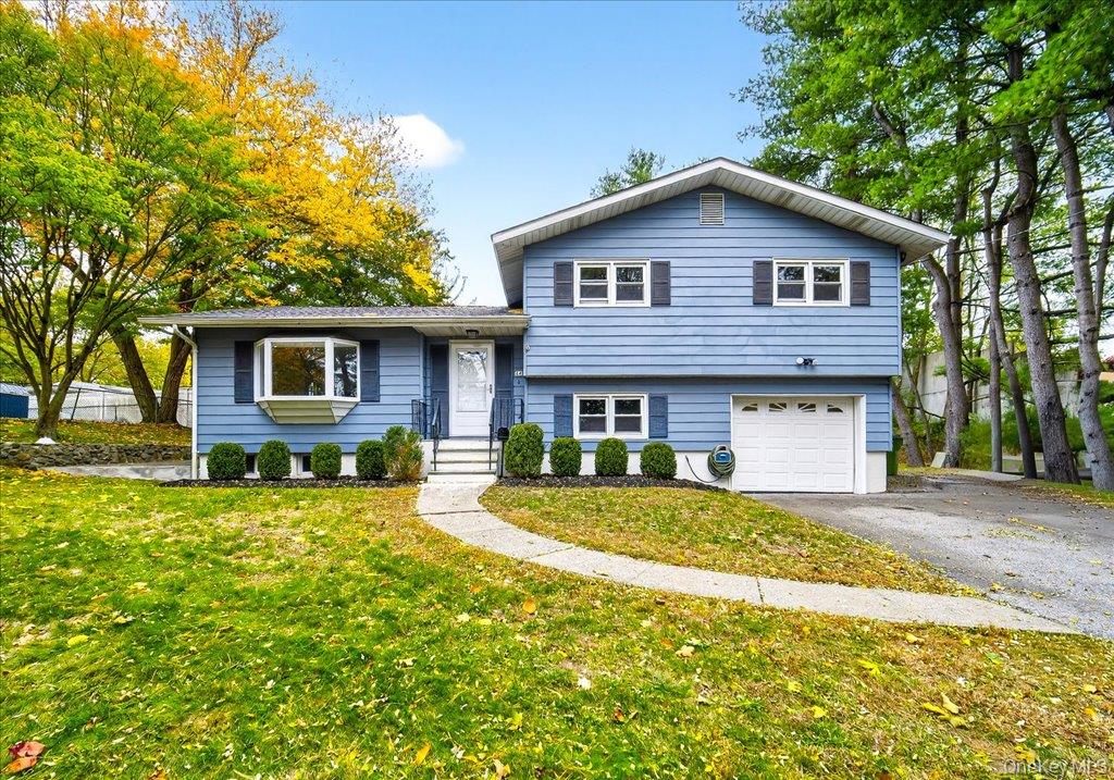 Welcome to Emerald Woods, one of Tarrytown’s most sought-after neighborhoods. Imagine arriving home each day along your own private street—peaceful, secluded, and entirely yours!
This beautifully split-level home offers a functional and inviting layout, perfect for a growing family. The first floor features an open-concept living area with a brand-new modern kitchen, seamlessly connecting to a private backyard and freshly painted deck—an ideal setting for outdoor dining and entertaining.
Upstairs, you’ll find three comfortable bedrooms and a full hall bath, while the spacious lower-level den provides the perfect space for a home office, playroom, or recreation area; with an additional full bath. The backyard is designed for gatherings on an oversized lot, complete with an above-ground pool. Additional highlights include a full-size attached garage, additional basement space for storage, and a 3-zone HVAC system for year-round comfort. The roof was replaced just five years ago, upgraded 200-amps; and all certificates of occupancy are in place. 
Enjoy an easy commute to NYC via Metro-North’s Tarrytown Station, and benefit from Irvington schools with a Tarrytown post office address. You’ll also love the convenient access to nearby parks, schools, shops, and all the charm that Tarrytown has to offer. All, right here in Emerald Woods!