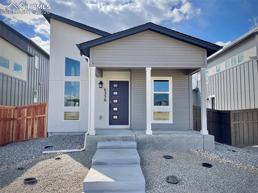 Ready now!  274 plan in the new Preamble Collection at Greenways.  Contemporary exterior.  Covered front porch.  2 bedroom, 1 bathroom, 2 car garage home.  Kitchen features Frost White Quartz countertops, island, and stainless steel appliances including a refrigerator.  Stackable washer and dryer conveniently located off of the bedrooms.  Vaulted ceilings provide drama to the home.  Full yard landscaping with irrigation included.  Blinds in bedroom and bath.  Home comes equipped with a heat pump for heating and cooling and a radon mitigation system.