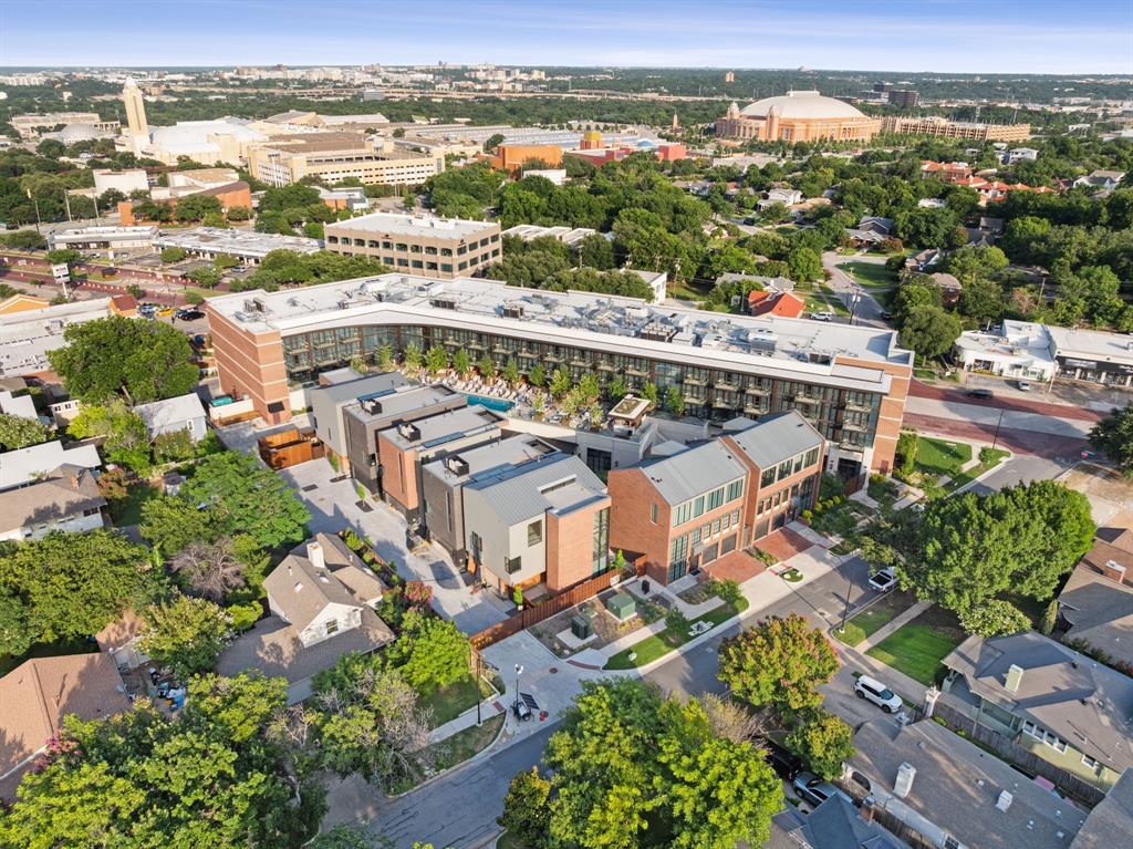 The Seven Residences at Bowie House offers a rare opportunity to own one of just seven sought-after residences located adjacent to Bowie House, part of the prestigious Auberge Resorts Collection in the heart of Fort Worth’s Cultural District.

These residences blend refined design with timeless craftsmanship. The exterior features earth-tone brick and spruce accents, inspired by the traditional Japanese Shou Sugi Ban technique. A landscaped courtyard leads to an entryway with layered textures, venetian plaster walls and ceilings, and wide plank white oak wood flooring. A sculptural staircase sits under the expansive skylight, connecting all levels with natural light and elegance. The private staircase makes this home perfect for anyone who desires a lock-and-leave home with 5-star amenities and service.

The third floor serves as the main living area, anchored by a fireplace, open layout, and oversized stacking floor-to-ceiling glass doors that lead to a terrace overlooking lush gardens. The kitchen features custom cabinetry, a premium appliance package, and luxurious countertops. A private two-car garage with basement storage and direct access to the home adds everyday ease.

Optional access to Bowie House amenities includes pool, cabanas, spa, gym, dog park, valet, concierge, in-room dining, and priority reservations at Bricks & Horses. Steps from world-class museums, Dickies Arena, Will Rogers Coliseum, and top dining, The Seven is ideal for buyers seeking a lock-and-leave lifestyle in one of Fort Worth’s most vibrant and walkable neighborhoods.

With two homes sold and a third under contract, don’t miss your chance to own this uniquely crafted, service-rich residence in Fort Worth’s premier cultural corridor.

NOTE: Residence #4 is under construction. All interior photos are from Residence #6. Design look books are available for preview with exact selections.