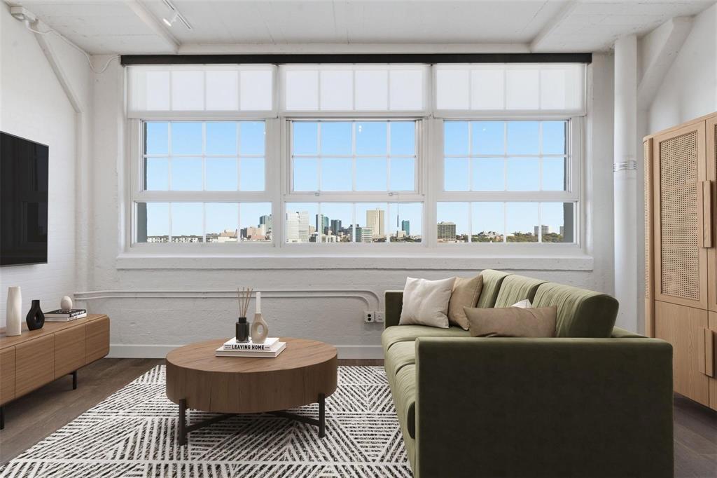 A rare opportunity to own a luxury loft style residence in one of Fort Worth’s most iconic addresses, the historic 1920s era Montgomery Plaza. Reconstructed to be Fort Worth's premier condo midrise neighborhood in the Cultural District in 2008, this Stunning 2 Bedroom and 2 Bath condo at Montgomery Plaza features unrestricted downtown Fort Worth views. Amenities include marble and wood look tile flooring, historic oversized windows with electric shades, customized closets, and built-in cabinetry. Gourmet kitchen boasts Monogram GE appliances, 36 in glass cooktop, wine cooler, built-in pantry, and sleek finishes. Two deeded garage parking spaces included. Residents enjoy resort style amenities: rooftop pool deck with cabanas and fire pits, fitness center, theater room, owners lounge, and 24 hour concierge. Prime location in the Cultural District, steps from dining, shopping, and entertainment.  Walk Score 77.  Bike Score 79. Trinity River Trails are nearby to walk and bike for miles along the Trinity River.