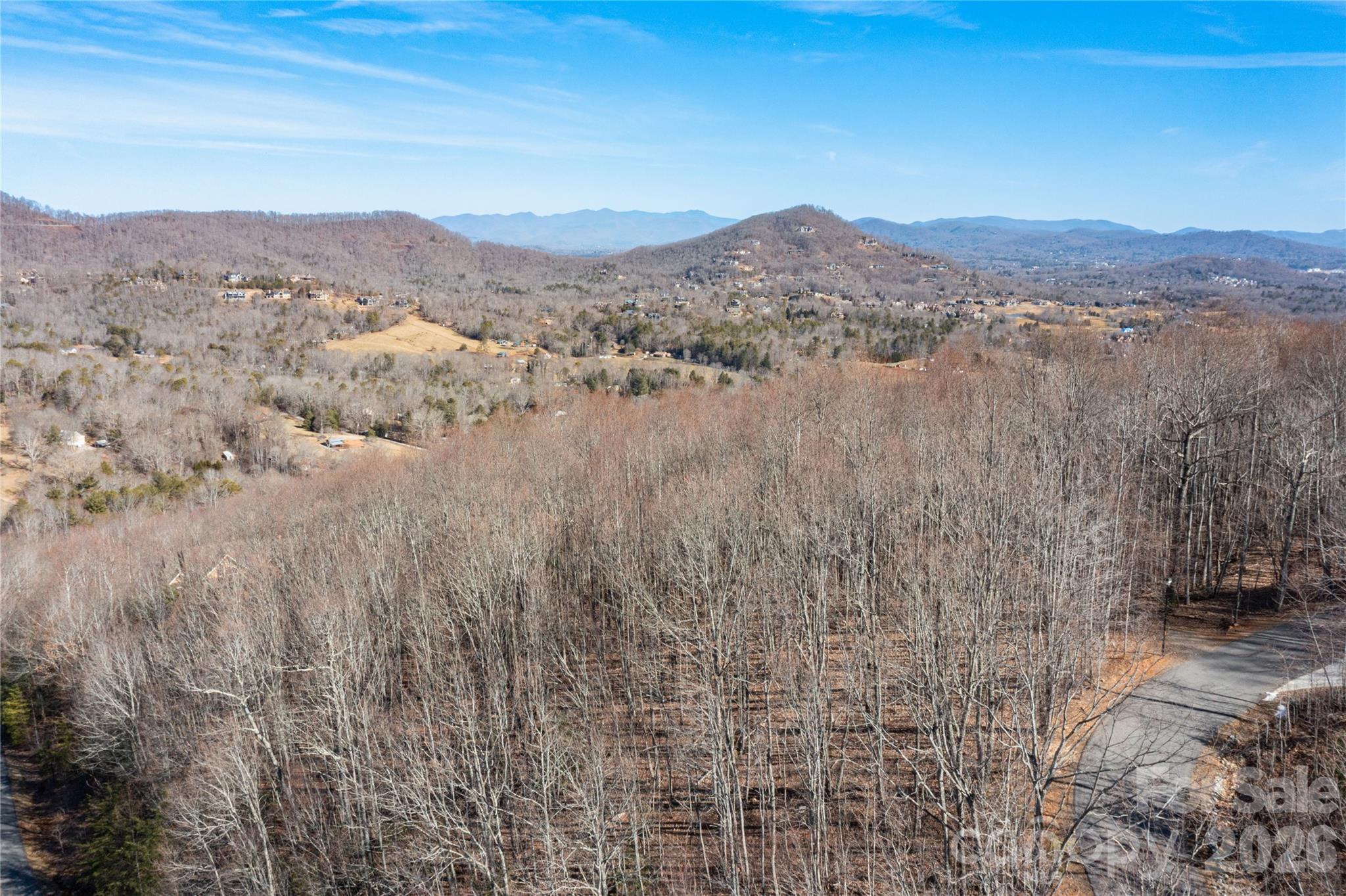 Ready to build with beautiful winter views from this nearly mountain top lot in Avery Park.  Recently surveyed with 4 bedroom septic permit and well consisting pump and wiring.  Best building site is NOT in the Steep Slope District and will save on your building costs.  Long Range Views with prudent tree clearing will keep this heavily wooded lot private and secluded, but still be very convenient to all necessities and amenities Arden has to offer.  Approximately 30 mins from Asheville.