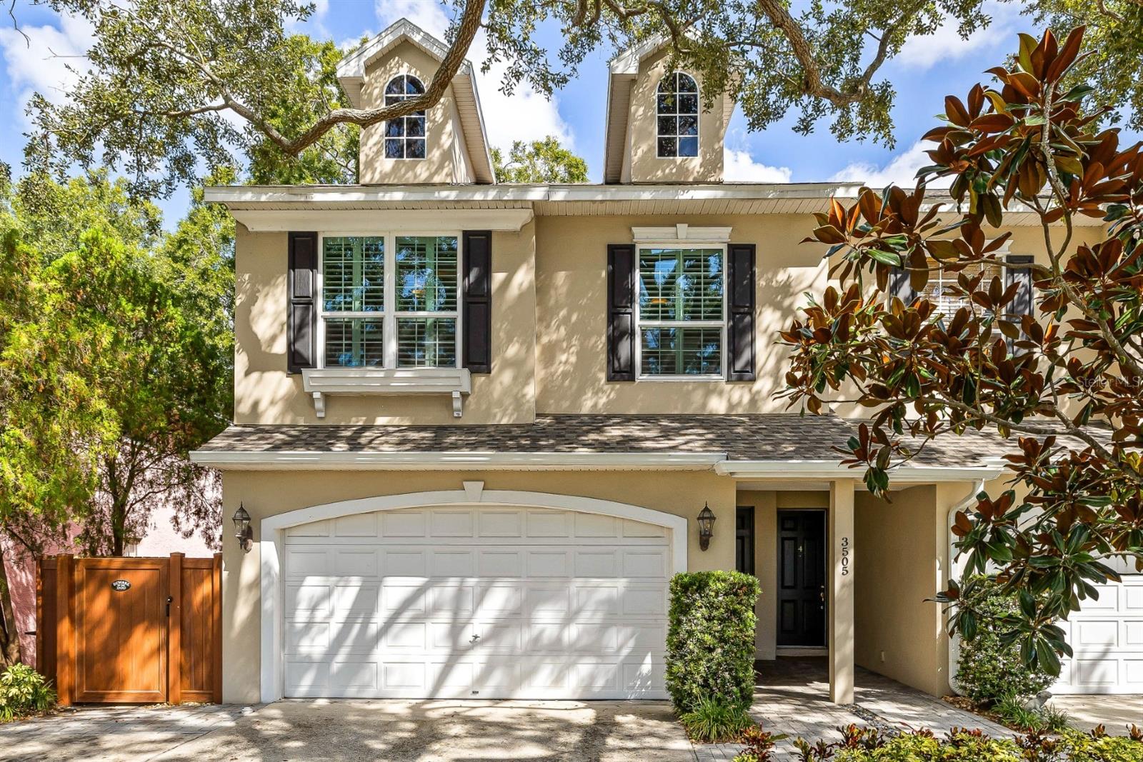 Live in one of the most desirable areas of South Tampa! This beautiful end-unit townhouse in Palma Ceia has 3 bedrooms, 2.5 bathrooms, and a little over 2300 square feet. You will love the floorplan and 10ft ceilings with 8ft doors throughout. As you walk inside you will see the door leading to the 2-car garage. There is a nice first floor half bathroom as well. The kitchen is large with a walk-in pantry and opens into the dining nook and living room area. Just off the dining nook there is a gorgeous, large, screened and covered patio. Perfect for relaxing in the shade! Upstairs is the main bedroom as well as 2 secondary bedrooms. The main bedroom has tray ceilings, lots of light, and 2 large closets. The main bathroom has a large soaking tub and separate shower. The laundry closet is upstairs with the bedrooms. Both secondary bedrooms are a great size with a lot of storage. A second full bathroom completes the upstairs. The windows were replaced in 2020 as well as gorgeous interior shutters. The A/C was replaced in 2023 for ease of mind, roof in 2024 and water heater in 2021. This townhouse is in Flood Zone X and has not had any history of flooding. Within walking distance to shops and restaurants including Louis Pappas and Kelp Sushi. Zoned for some of the best schools. Less than 15 minutes to MacDill, 10 minutes to downtown Tampa, and less than 20 minutes to the airport. One or more photos is virtually staged.