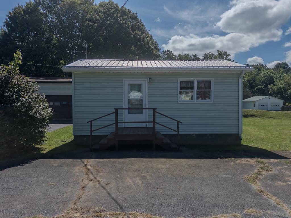 Unlock the potential of this versatile property at 166 Slemp Creek Road in the peaceful community of Sugar Grove, VA. Formerly home to a long-running and successful beauty salon, this building is now a blank slate—384 square feet of opportunity, ready for your vision. It's the perfect spot for your tiny home or rental! The structure has been mostly gutted, providing a clean start for its next owner. It features newly constructed entry steps on both the front and back, plumbing for one bathroom, and additional plumbing lines already in place from its salon days—perfect for future kitchen fixtures or expansion. The property includes a paved parking area plus .23 acres of flat, usable land offering valuable flexibility. Situated between Marion, VA, and the boundless recreation of the Appalachian Trail and Jefferson National Forest, this location is the ideal place for a peaceful retreat. Its size, setting, and infrastructure make it an ideal candidate for a short-term rental conversion or other creative ventures. Whether you're an entrepreneur looking to start fresh, an investor seeking a profitable rental property, or a visionary ready to breathe new life into this space, 166 Slemp Creek Road offers the rare combination of affordability, flexibility, and location.