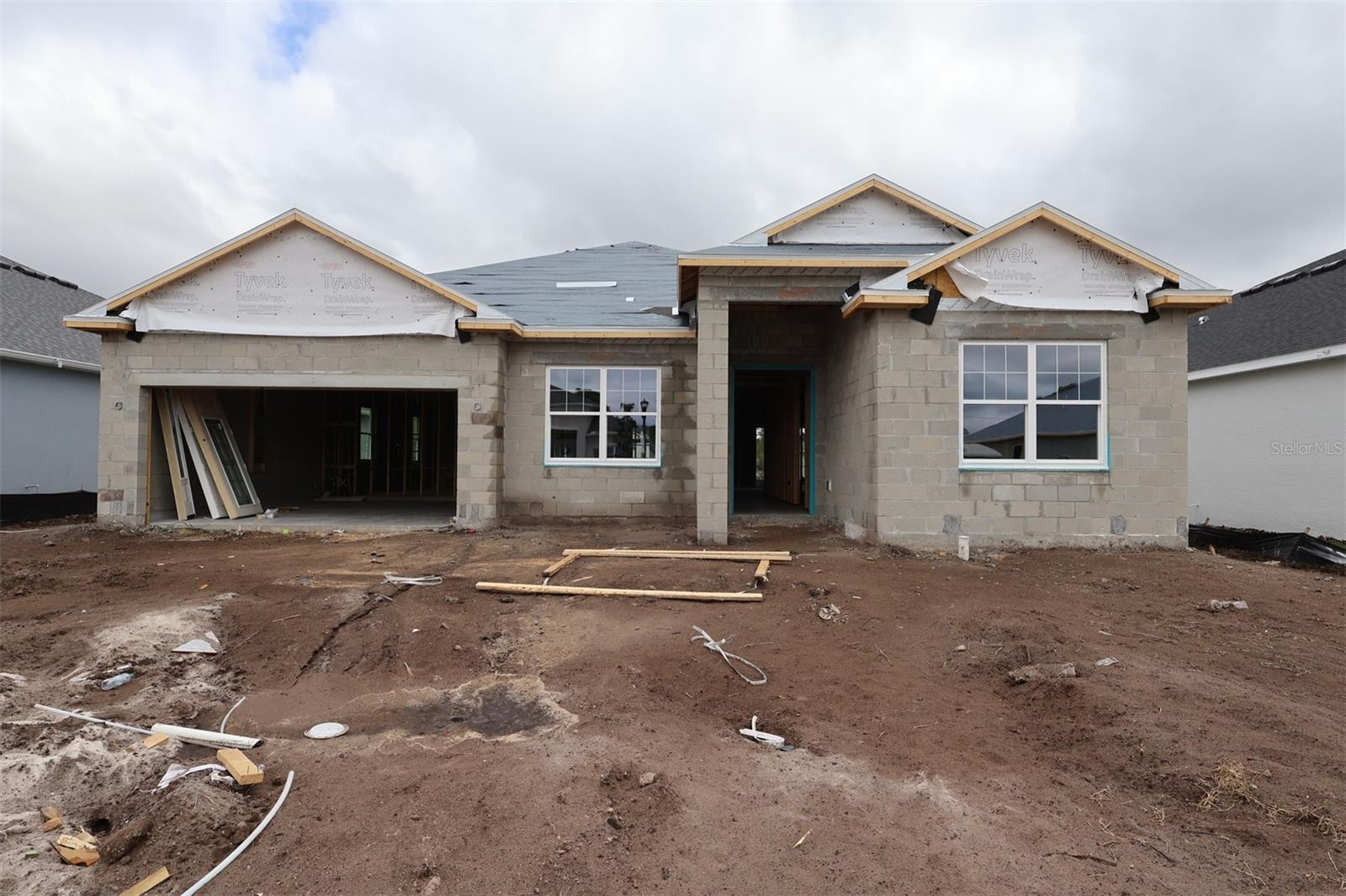 Under Construction. This new construction home at 2711 Ravencliffe Terrace in Oviedo offers 2,531 square feet of thoughtfully designed living space. Built by M/I Homes, this 4-bedroom, 3-bathroom home features an open-concept living space that creates seamless flow between the main gathering areas.As you enter through the front door, there is a versatile flex room, a laundry room, and a hallway to the 2-car garage on your left; on the right side are two bedrooms with a Jack-and-Jill bathroom. Continue to the open-concept heart of this home, where the kitchen, dining areas, and living room flow together to create an inviting atmosphere for daily life and entertaining. The kitchen features a large island and loads of cabinets and countertop space.Flexible enough to have formal and informal areas, the living room area provides plenty of space, oversized windows, and sliding doors to the lanai. A hallway adjacent to the informal dining room leads to the fourth bedroom and third bathroom.Your owner's suite is located in the corner of this home and features a large walk-in closet and an en-suite bathrooms with dual sinks, a linen closet, and a separate shower and soaker tub.