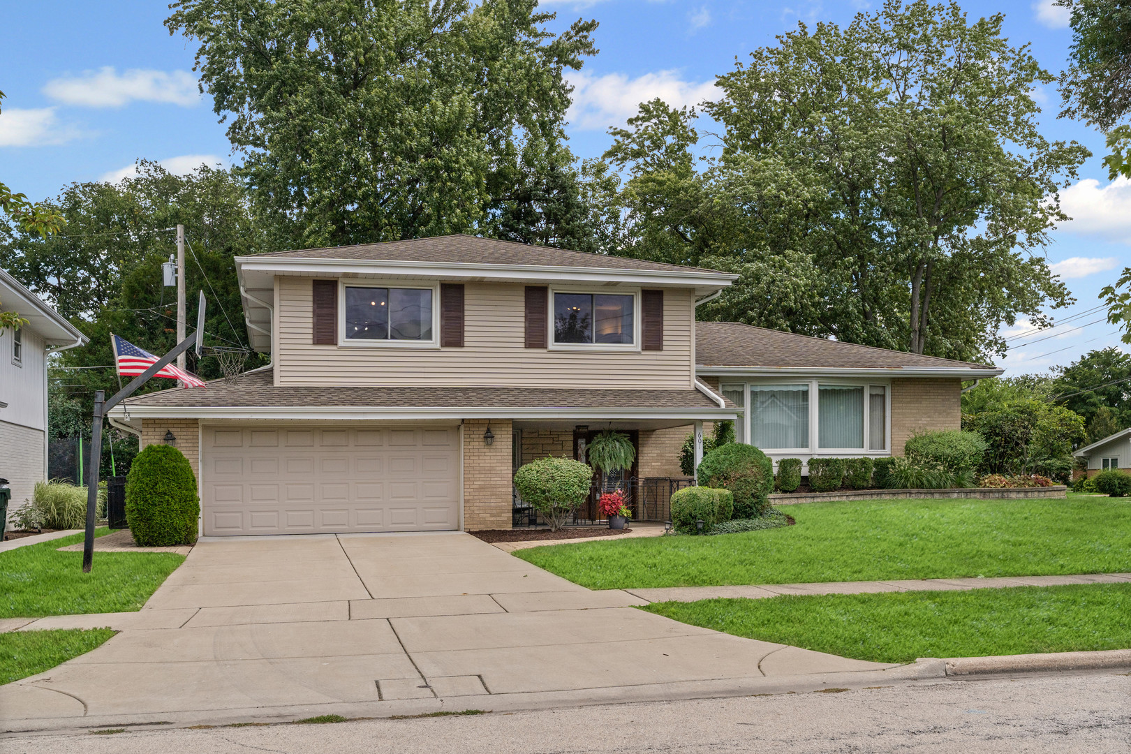 This well maintained 4 bedroom with 2 full and 1 half baths tri-level, is the ideal Park Ridge family home. All four bedrooms are generously sized and are located on the upper level and have hardwood under the carpeting. First floor large family room has a cozy stone fireplace and 10 foot sliding glass doors that overlook the paver patio and fenced in yard. Spacious living room contains large bay window that floods room with natural light and is adjacent to elegant dining room. Eat in kitchen has custom cherry cabinets with built in stainless steel appliances. Recreation room is perfect for entertaining overflow or for the kids to just hang out. Massive laundry room can have dual usage for work shop, at home office or exercise room. All conveniently located 1 block from top ranked Carpenter elementary school, 5 blocks from Metra station, under 5 minutes to expressway and just blocks away to enjoy Des Plaines River woods with walking/bike path.