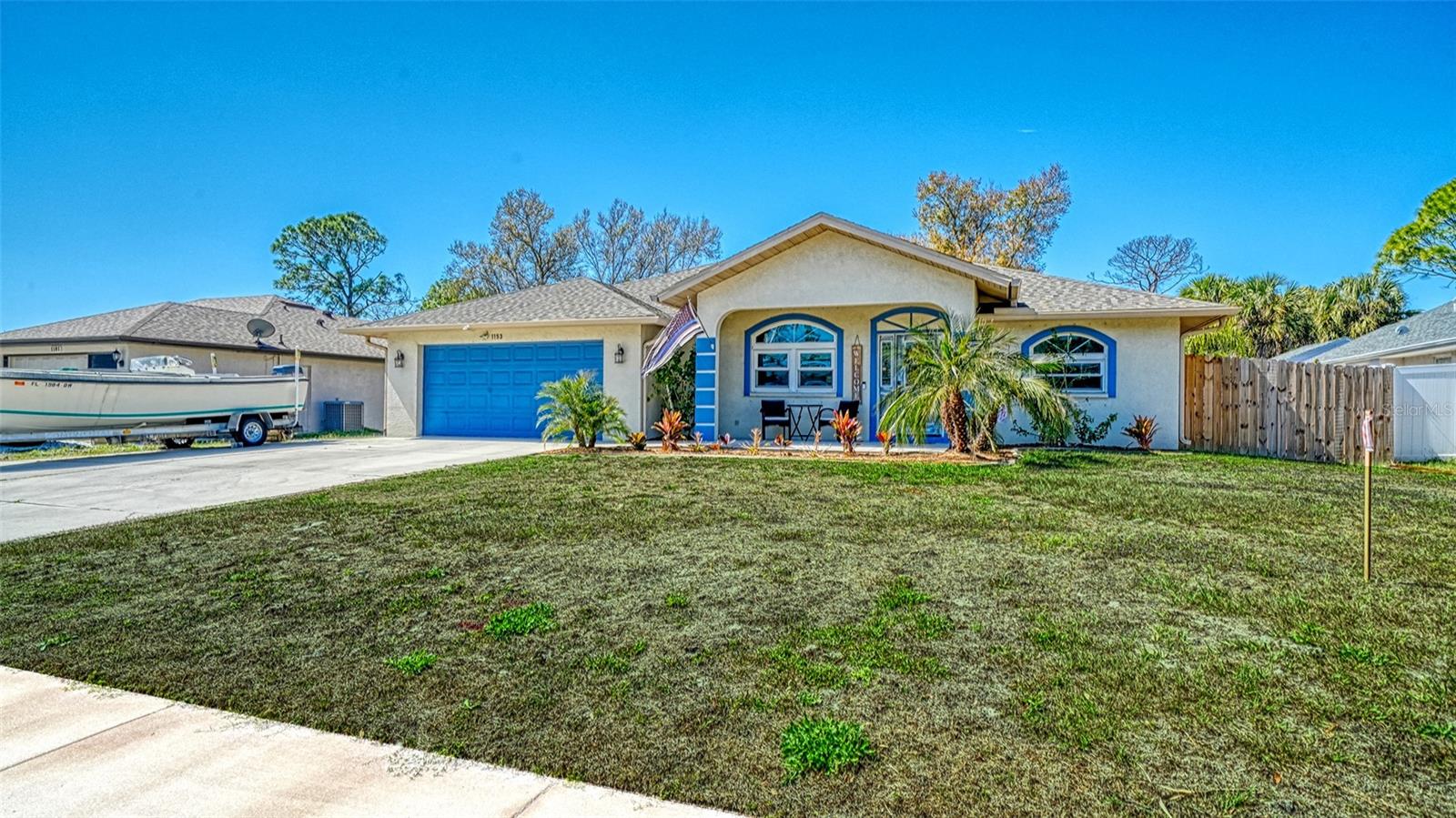 Totally updated home with 3 bedrooms 2 bathrooms and 2 car garage with City water. This home is open and bright with vaulted ceiling and tile throughout. NO CARPET. The new kitchen has plenty of storage and counter space with custom cabinetry and quartz counters with a copper sink. Both bathrooms are tastefully updated as well. This home has a large fenced backyard with a brick patio and fire pit, and also has a shed/workshop measuring 12 feet by 16 feet. NEW ROOF in 2024, NEW A/C in 2022, and NEW WATER HEATER in 2025. The home has City water with a water softener. Other upgrades include double pane windows, new insulation, radiant barrier, and an attic fan. The driveway is very long and triple wide with plenty of room for cars, trucks, boats and RV's. Great location, close to I-75, beaches, restaurants and shopping. NOT in a FLOOD ZONE, and NO HOA, NO CDD.