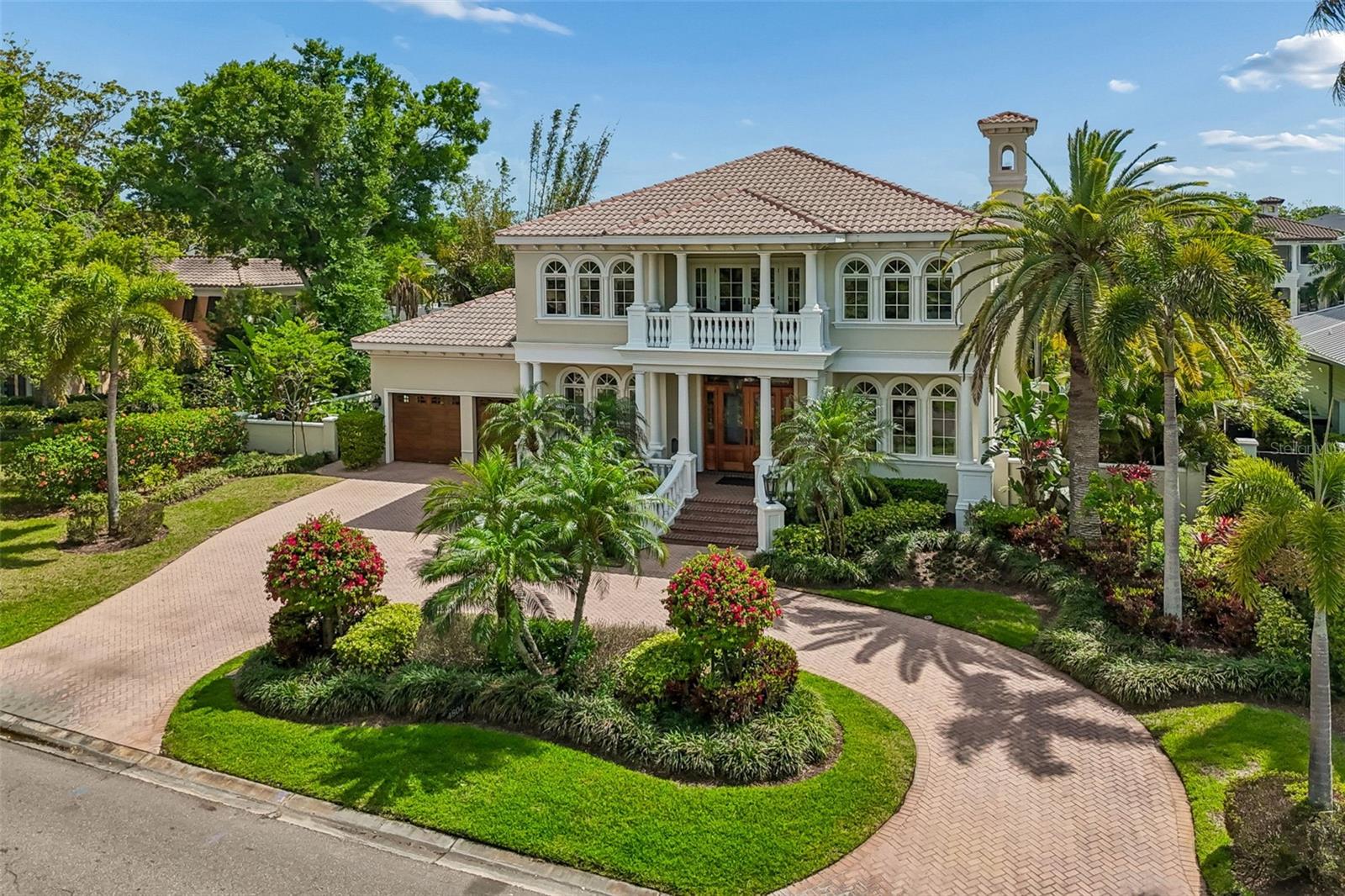 Welcome to 4804 Culbreath Isles Rd., a Magnificent Custom Built beauty with contemporary flair set on the Grand Canal of Culbreath Isles, Tampa's top guarded and gated community.  Built in 2006 and beautifully updated and maintained, this 5663sf residence features expansive spaces for entertaining and a dock equipped for a 52 foot yacht on a protected deep water canal, 6 bedrooms including a first floor bedroom and full bath being used as an office, 5.5 baths, a dramatic two story foyer, separate sun filled living & dining room, a grand 36 x 30 family room with fireplace and wet bar and room for a pool table all overlooking the water.  The gourmet kitchen has top of the line appliances including a Viking six burner stove top and grill, SubZero refrigerator, Decor double ovens, Bosch dishwasher, huge walk in pantry and separate breakfast room.  The primary suite offers a large bath, office, and a balcony overlooking the water.  The office could be redesigned as a fabulous dressing room.  The outdoor living space has spacious covered seating, heated pool and spa, and an outdoor kitchen.  Enjoy the luxury of waterfront living in Culbreath Isles, located minutes to Tampa International Airport, top rated public and private schools, world class shopping and dining, Westshore Business District, Downtown, and the Nations Top Beaches!  You can have it all!