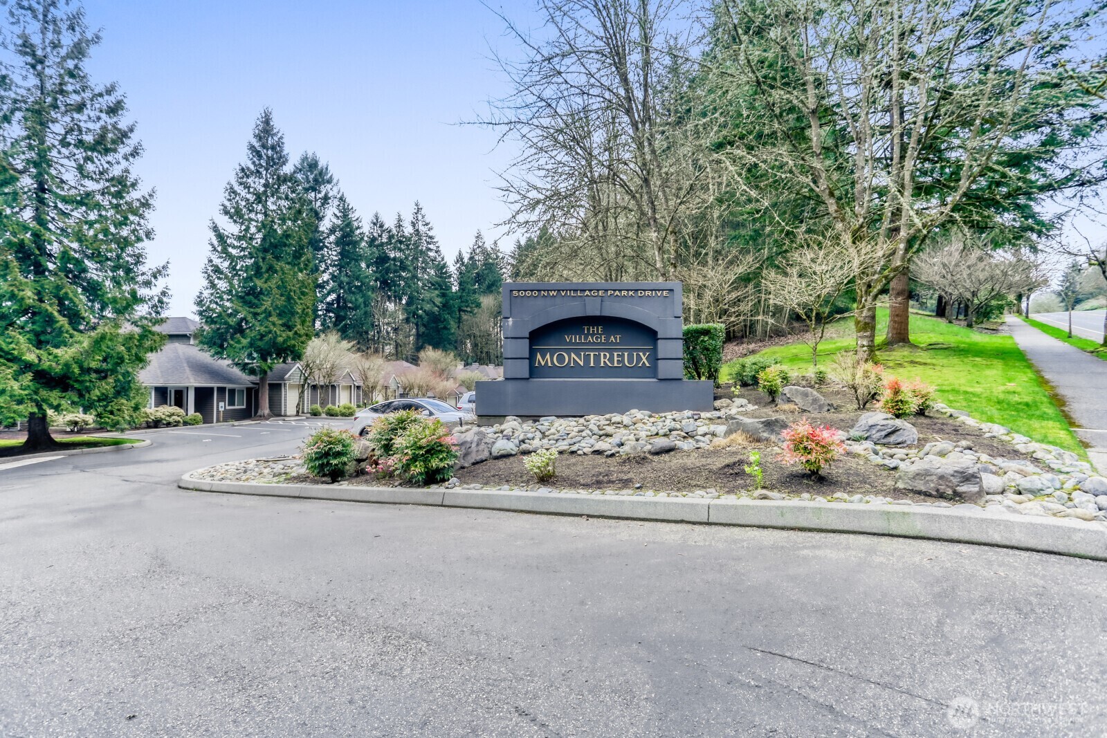 Enjoy peaceful living in this beautifully updated condo in the sought-after Montreux community, nestled in the desirable Lakemont neighborhood. This ground-level 1bed/1bath home is surrounded by tree-lined walkways and stunning mountain views, offering the perfect balance of serenity and convenience. Inside, you’ll find brand-new hardwood floors, fresh interior paint, and a fully updated kitchen featuring all brand-new stainless-steel appliances, a deep stainless-steel sink, quartz countertops, and a stylish breakfast bar. The open-concept living and dining area is filled with natural light and anchored by a cozy gas fireplace. Step out onto the covered deck for seamless indoor-outdoor living. The spacious bedroom complements a newly updated bathroom, creating a comfortable and inviting retreat. Additional highlights include in-unit full-size stacked washer and dryer, one covered carport parking space and ample guest parking. Well-managed HOA with reasonable dues covering water, sewer, gas, and garbage. Pet-friendly and no rental cap for added investment flexibility. Ideally located just minutes from I-90 for easy access to downtown Issaquah or Bellevue, and close to shops, restaurants, lakes, parks, and trails. This move-in-ready home offers exceptional comfort, convenience, and long-term potential.