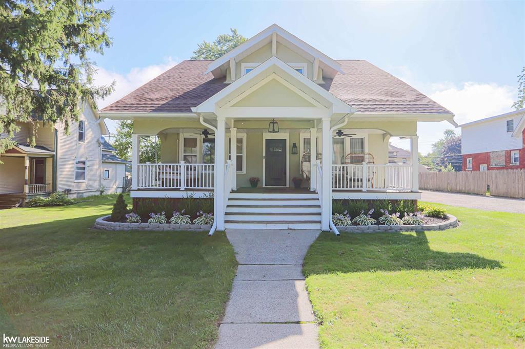 Welcome to this beautifully maintained 4-bedroom (possibility of 5), 3-bath historic home in the heart of the Village of Capac! Offering over 2,700 sq ft of living space, this charming 2-story residence combines timeless character with modern updates. Inside you'll find soaring 9+ ft ceilings, hardwood floors, a spacious living room with a cozy fireplace, a large eat-in kitchen, and flexible spaces including a library/den or home office. Upstairs, the primary suite features a walk-in closet and convenient second-floor laundry, along with three additional bedrooms. Outside, enjoy summer fun with the above-ground pool, deck, and yard space ideal for entertaining.  Living here means being part of a welcoming small-town community with the convenience of nearby amenities. Capac Community Schools serve the area, and families will appreciate the close-knit atmosphere and local pride. Nearby parks, including Capac Memorial Park, offer ball fields, playgrounds, and community events throughout the year. Commuters will love the easy access to I-69, providing a quick drive to Port Huron, Flint, and Metro Detroit. Enjoy the best of both worlds-peaceful village living with schools, shopping, and dining just around the corner. Don't miss your chance to own a piece of Capac history with modern comfort-schedule your showing today!