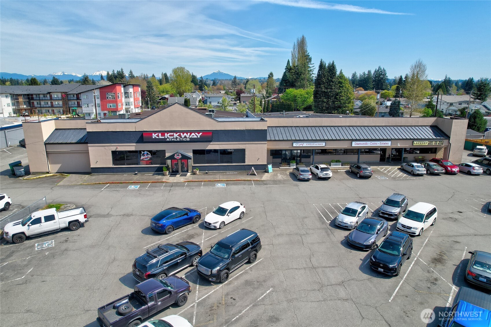 This family owned building is on the market, located in central Marysville, and is fully occupied with long term tenants. Current tenants include a gym, pawn and jewelry shop, laundromat, and coffee stand. The building has a sprinkler system, paved parking lot with over 105 parking spaces, and is in a prime location! Just 5 minutes to I-5 for commuting and for ease of access for tenant customers. This is your opportunity to own prime real estate with Downtown Commercial Zoning in fast growing Marysville with a CAP rate of 9.6% and annual rent increases. Sellers will carry a contract: 25% down, 5% interest, 30 year am, 5 year cash out. Ideal for an investor with an eye towards the future.