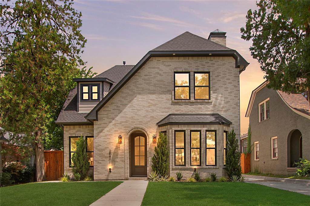 Set in one of Dallas’ most sought-after neighborhoods, the M Streets, this brand-new Tudor seamlessly combines timeless curb appeal with modern luxury and is zoned to award-winning Mockingbird Elementary. It offers 3,506 sq ft of light-filled living plus a 414 sq ft guest house with a full bath, ideal for a private office, gym, or in-law suite. This beautifully designed home includes 6 bedrooms and 5 full bathrooms, totaling 3,920 sq ft of living space when including the guest quarters (not reflected in MLS sqft). Inside, wide-plank white oak floors run throughout, setting the stage for a first-floor primary and guest room, and a designer kitchen crowned by a Taj Mahal quartzite waterfall island, custom inset cabinetry, plaster hood, and high-end appliances, including a Viking fridge that conveys. Vaulted ceilings, arched doorways, and curated lighting add warmth and architectural charm. Upstairs, three spacious bedrooms surround a central media lounge, perfect for cozy movie nights or play space.  Stroll to Greenville Avenue cafés, Glencoe Park trails, and top rated Mockingbird Elementary—the very lifestyle that makes the M-Streets so beloved—all with the comfort and peace of mind of brand-new construction.